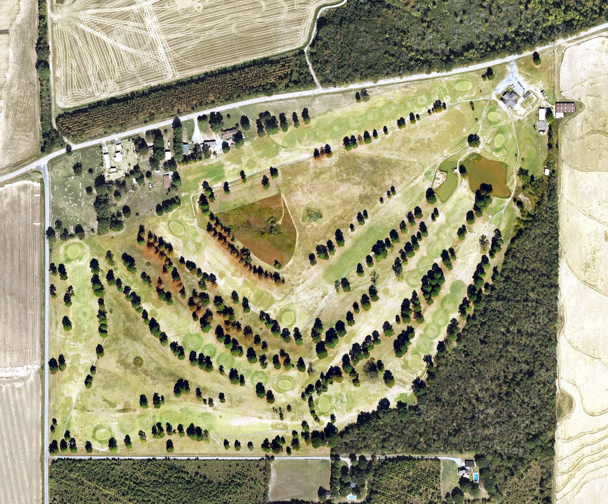 Aerial view of England Country Club, AR, with its hole routing marked