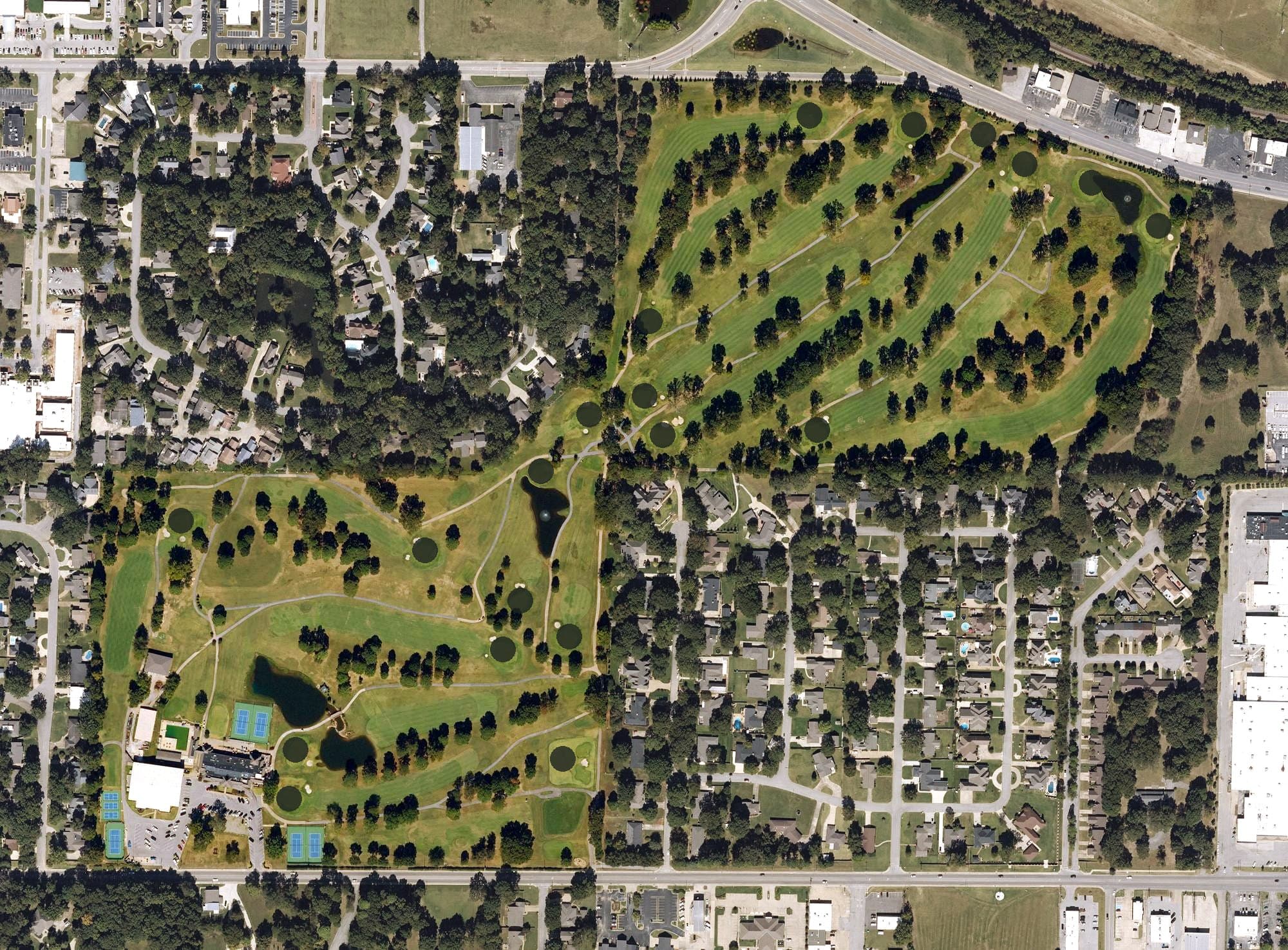 Aerial view of Jonesboro Country Club, AR, with its hole routing marked