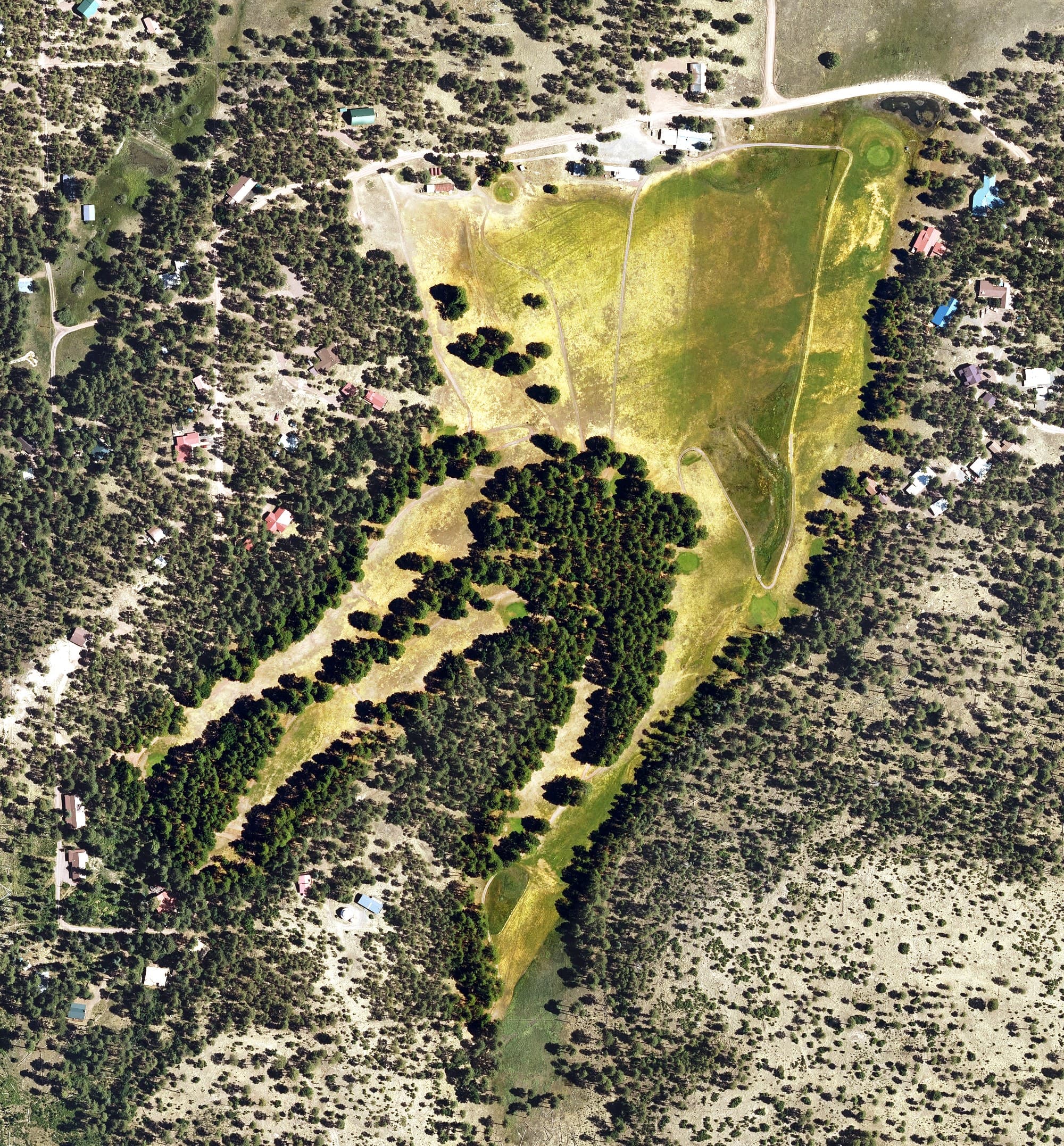 Aerial view of Alpine Golf & Country Club, AZ, with its hole routing marked