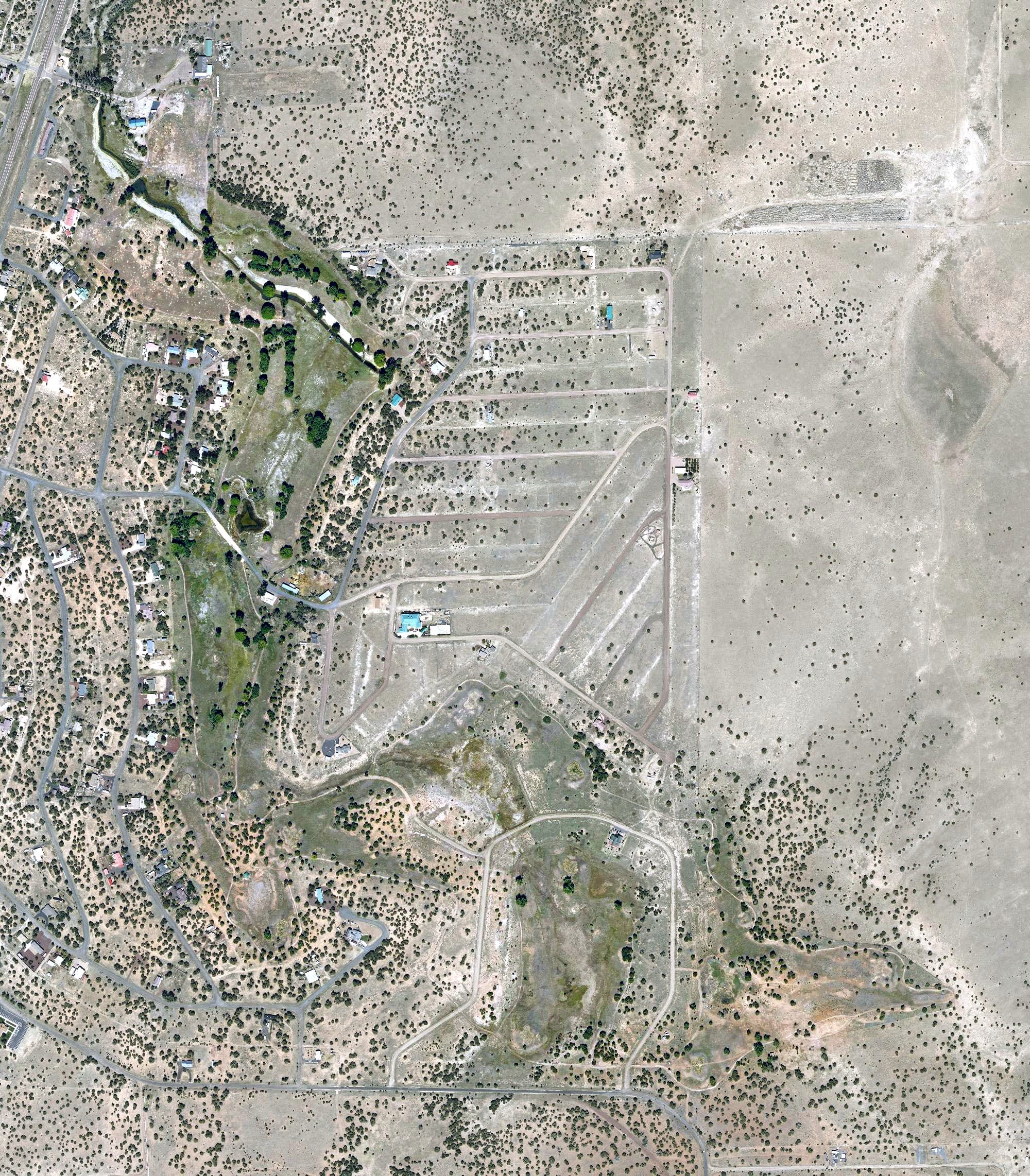 Aerial view of Concho Valley Country Club, AZ, with its hole routing marked