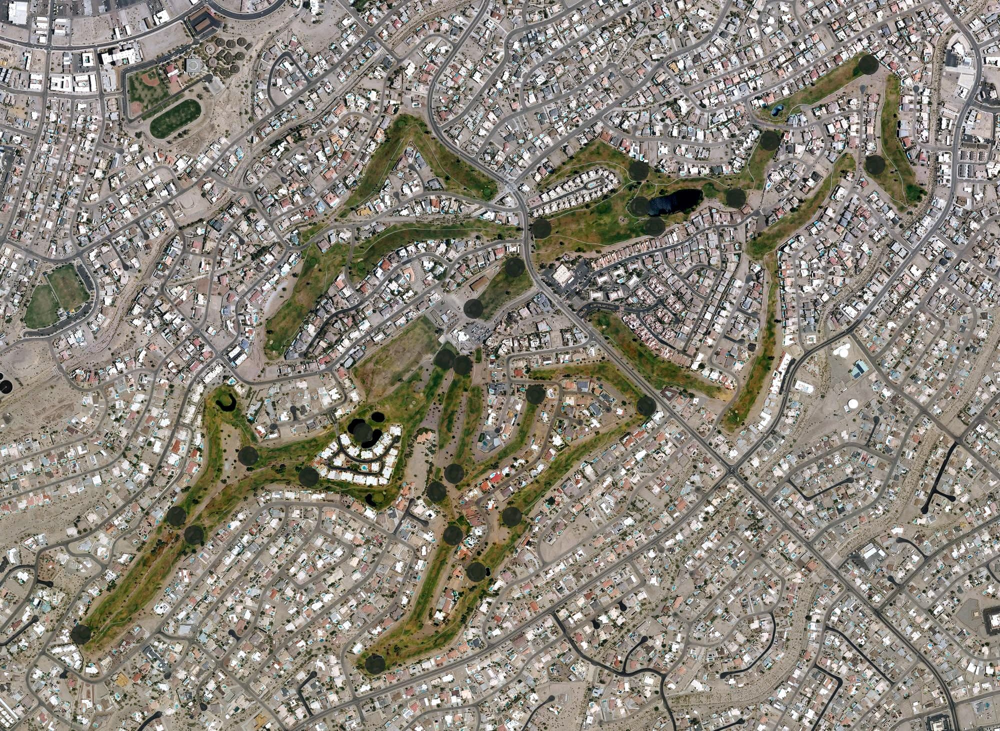 Aerial view of London Bridge Golf Club, AZ, with its hole routing marked