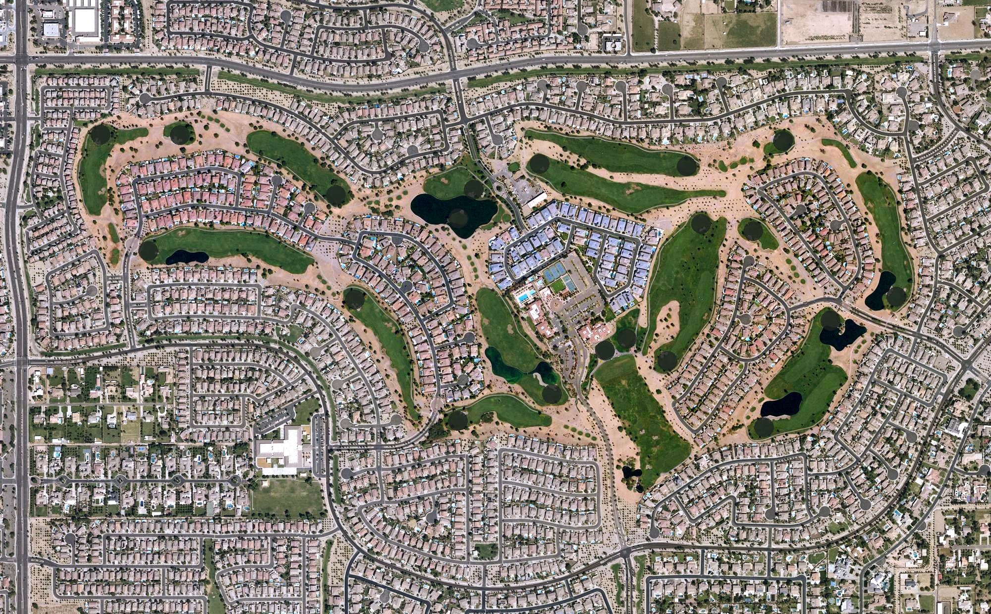 Aerial view of Seville Golf & Country Club, AZ, with its hole routing marked