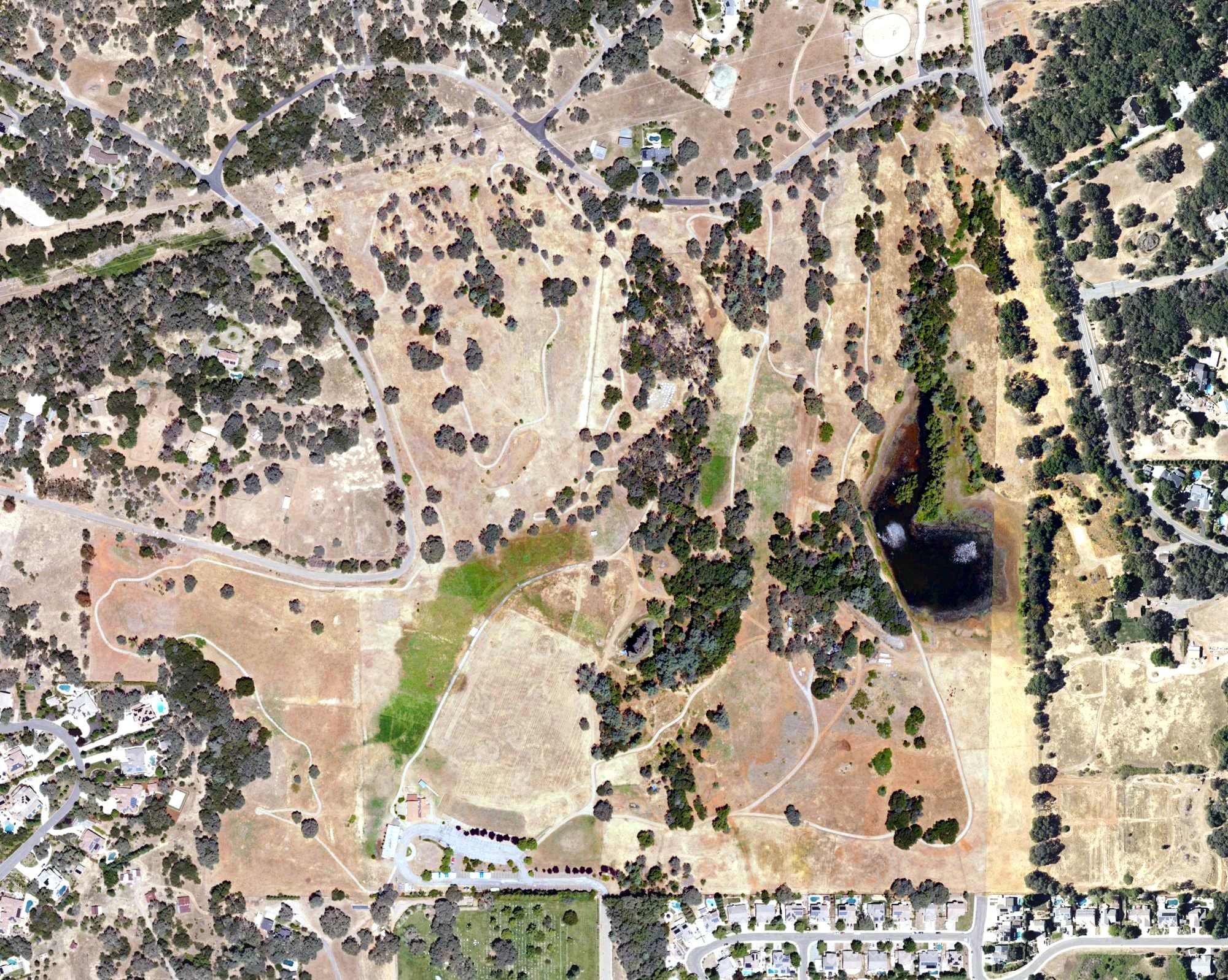 Aerial view of Bass Lake Golf Course, CA, with its hole routing marked