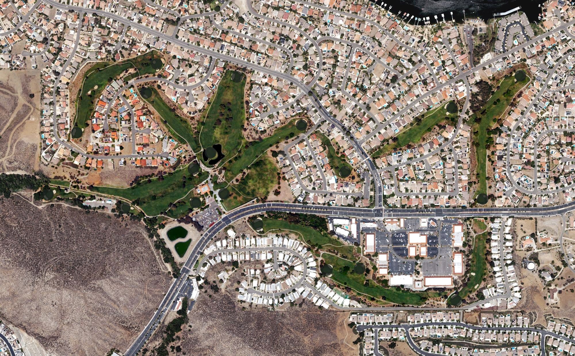 Aerial view of Canyon Lake Golf and Country Club, CA, with its hole routing marked
