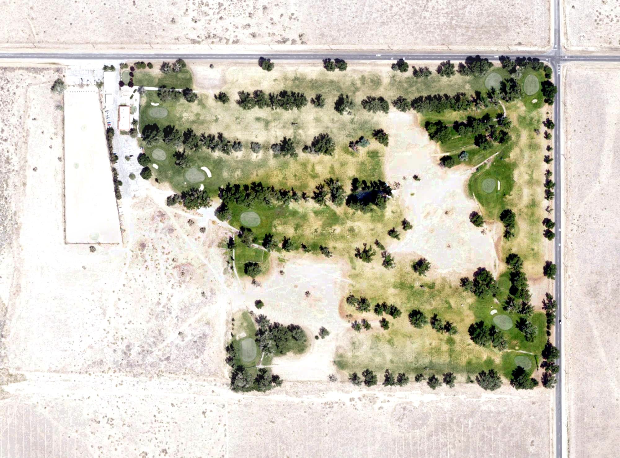Aerial view of Desert Aire Golf Course, CA, with its hole routing marked