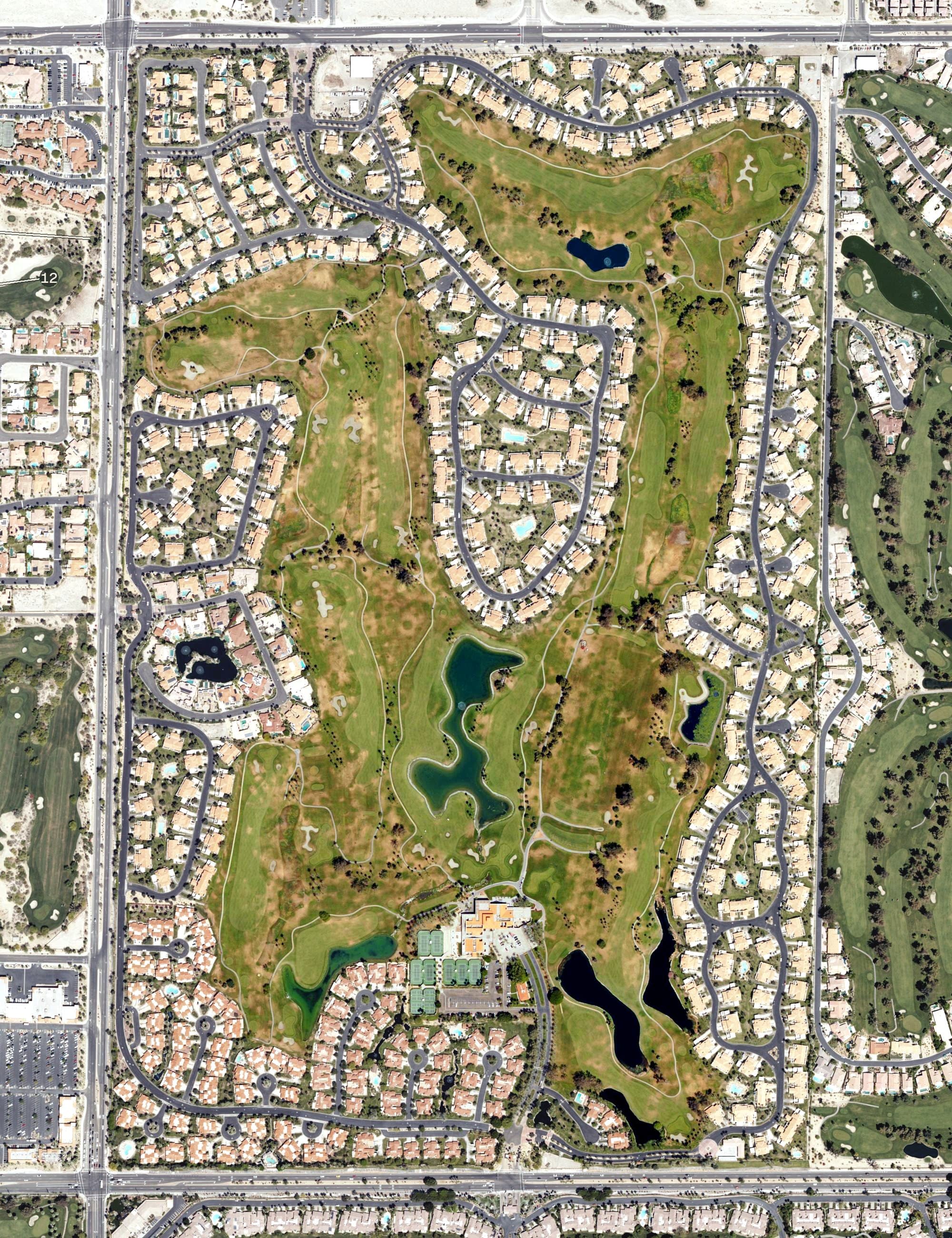 Aerial view of Desert Falls Country Club, CA, with its hole routing marked