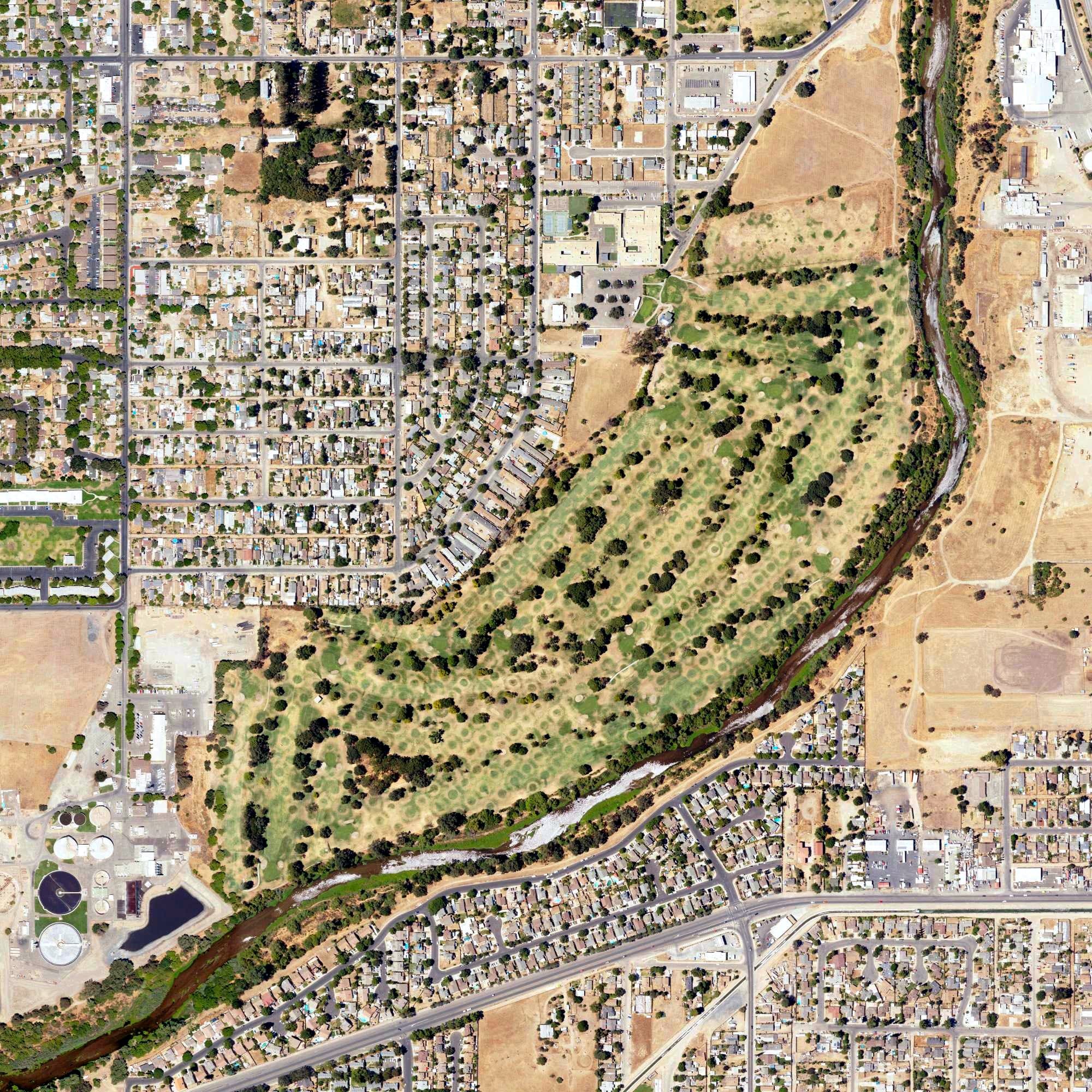 Aerial view of Dryden Park Golf Course, CA, with its hole routing marked