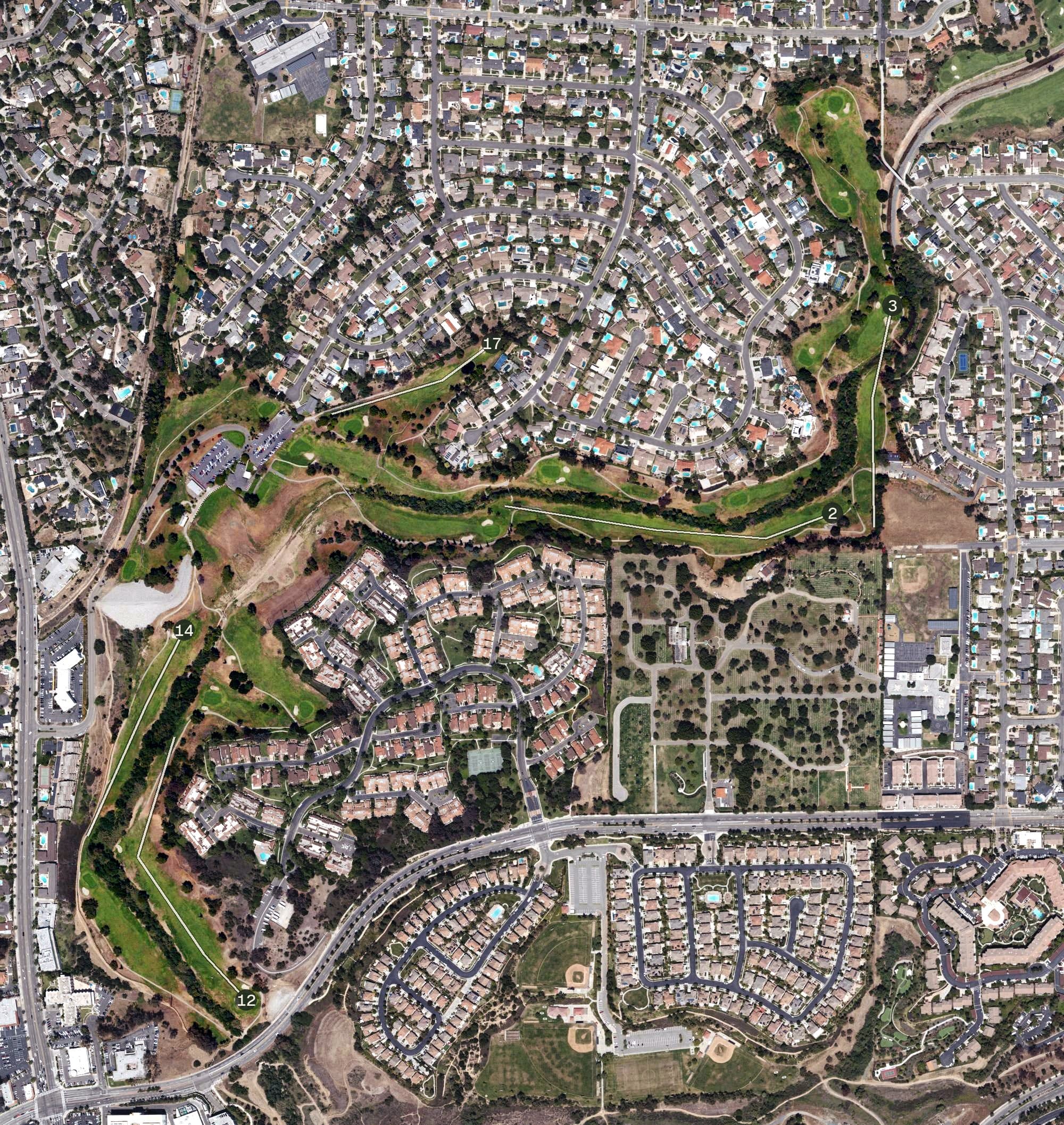 Aerial view of Fullerton Municipal Golf Course, CA, with its hole routing marked