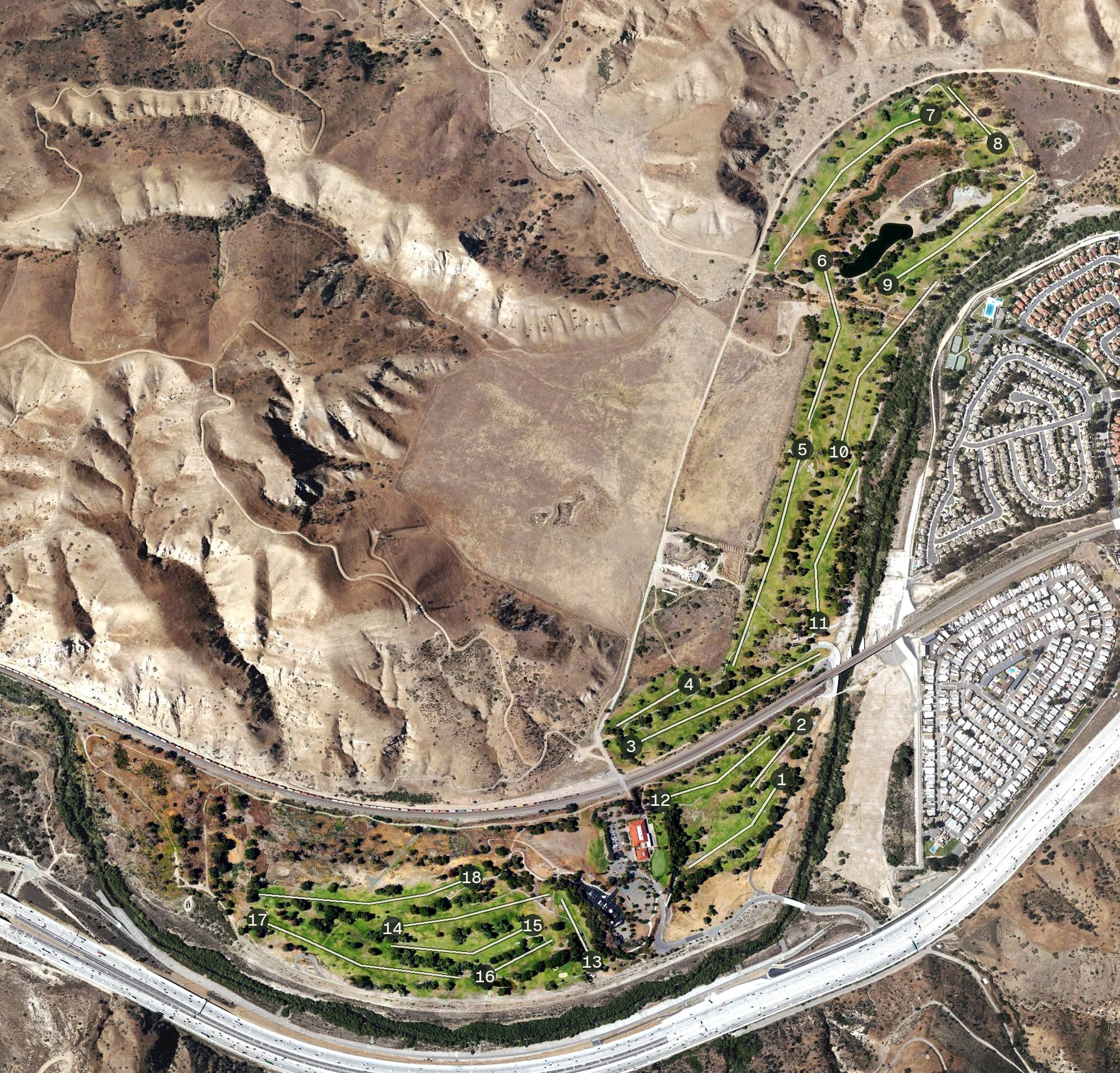 Aerial view of Green River Golf Club, CA, with its hole routing marked