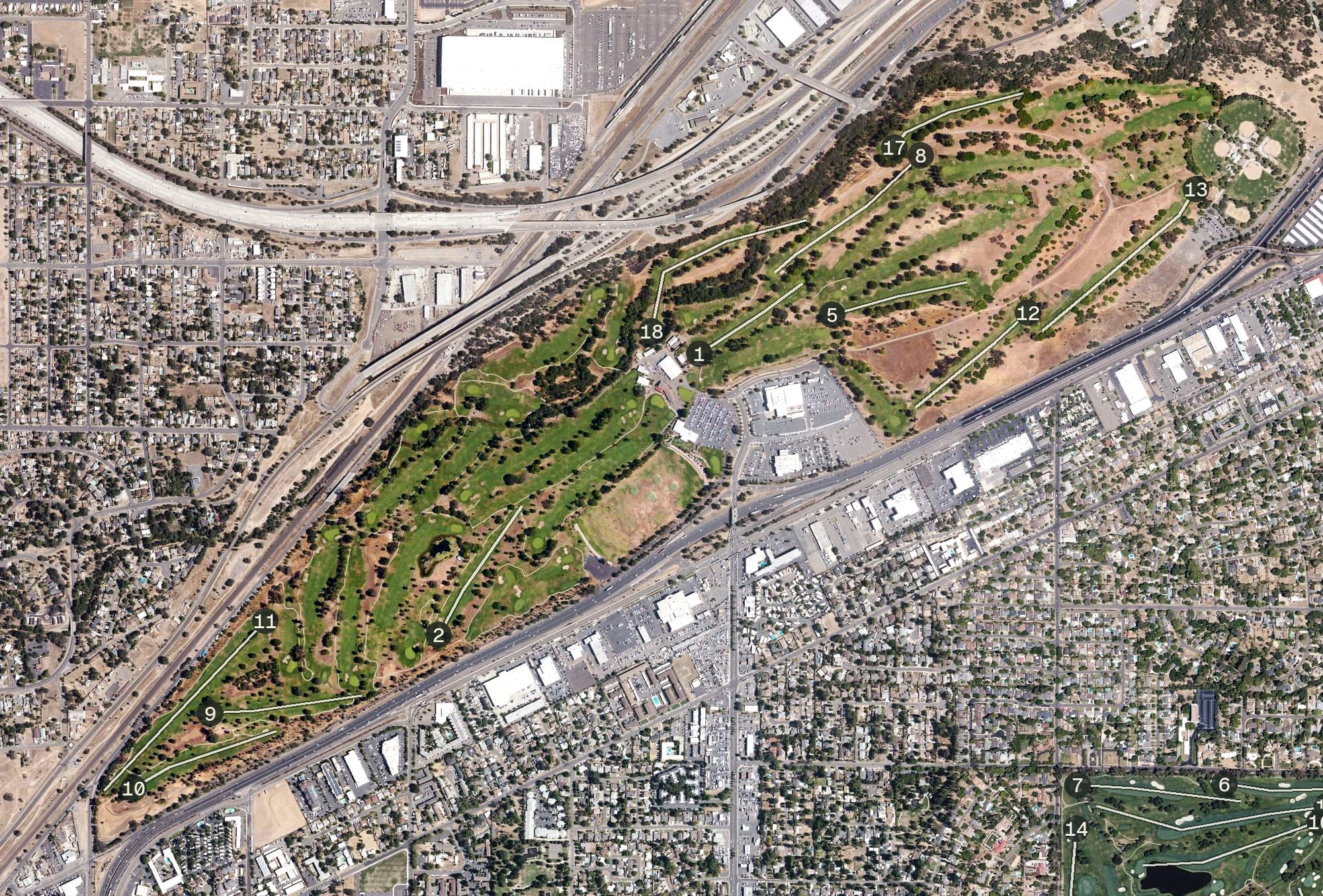 Aerial view of Haggin Oaks Golf Complex, CA, with its hole routing marked