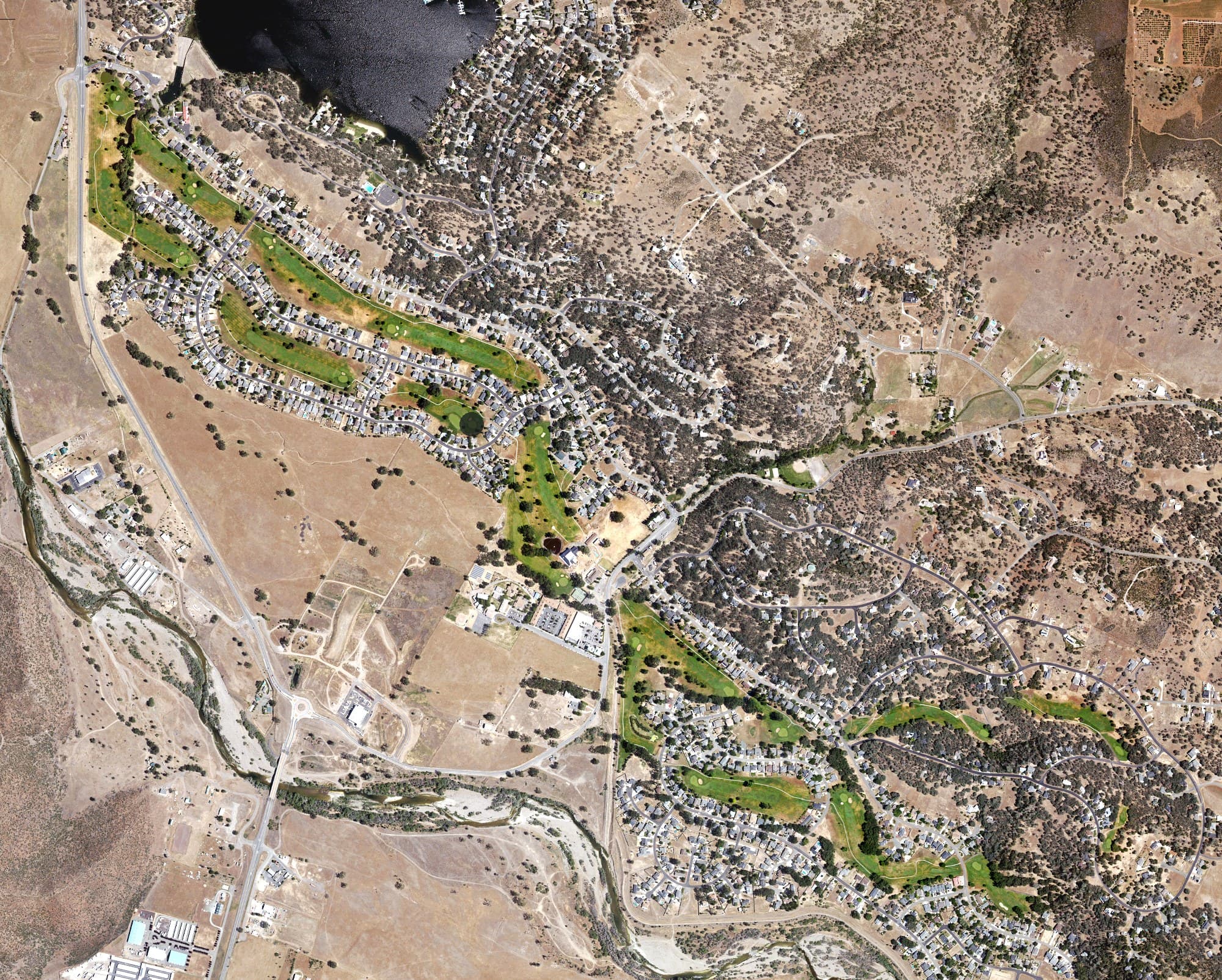 Aerial view of Hidden Valley Lake Golf Course, CA, with its hole routing marked