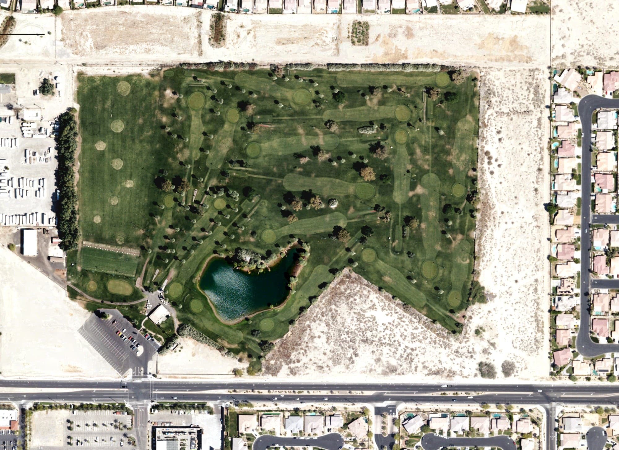 Aerial view of Indio Municipal Golf Course, CA, with its hole routing marked