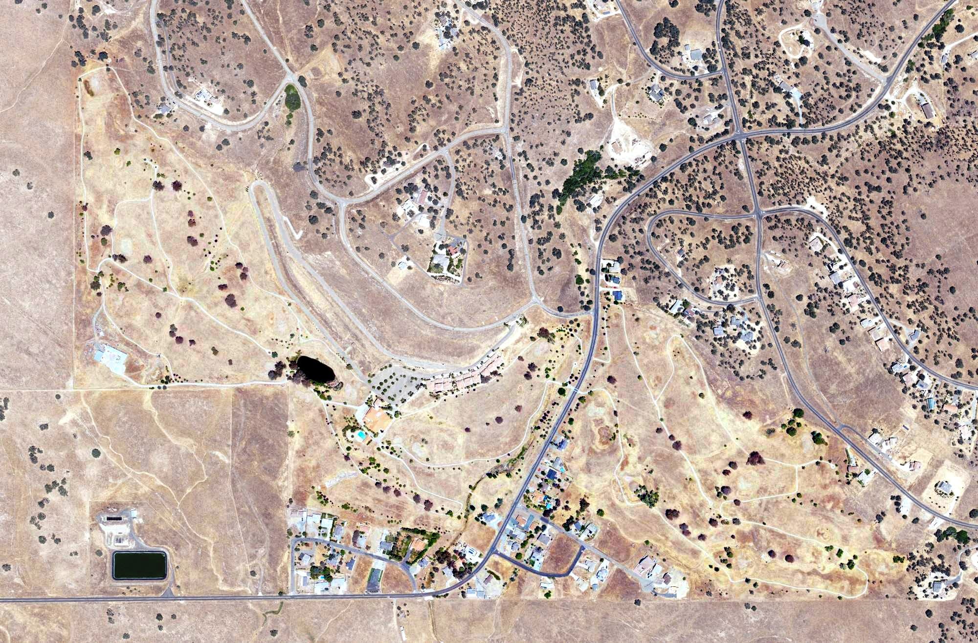 Aerial view of Lake Don Pedro Golf Course, CA, with its hole routing marked