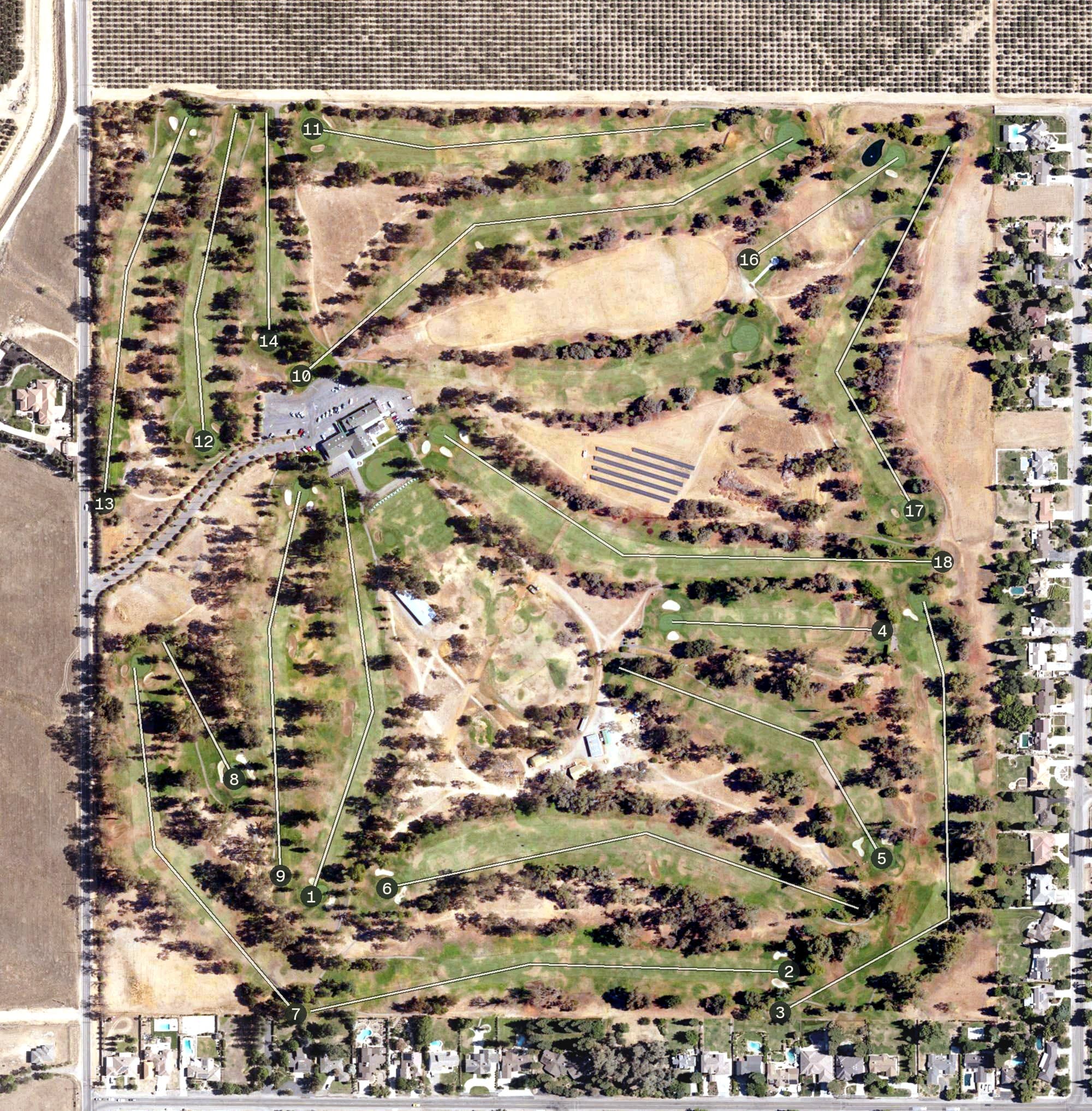 Aerial view of Madera Golf and Country Club, CA, with its hole routing marked