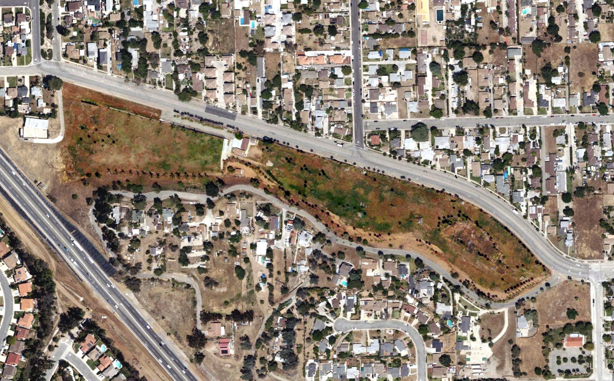 Aerial view of Palm Lake Golf Course, CA, with its hole routing marked