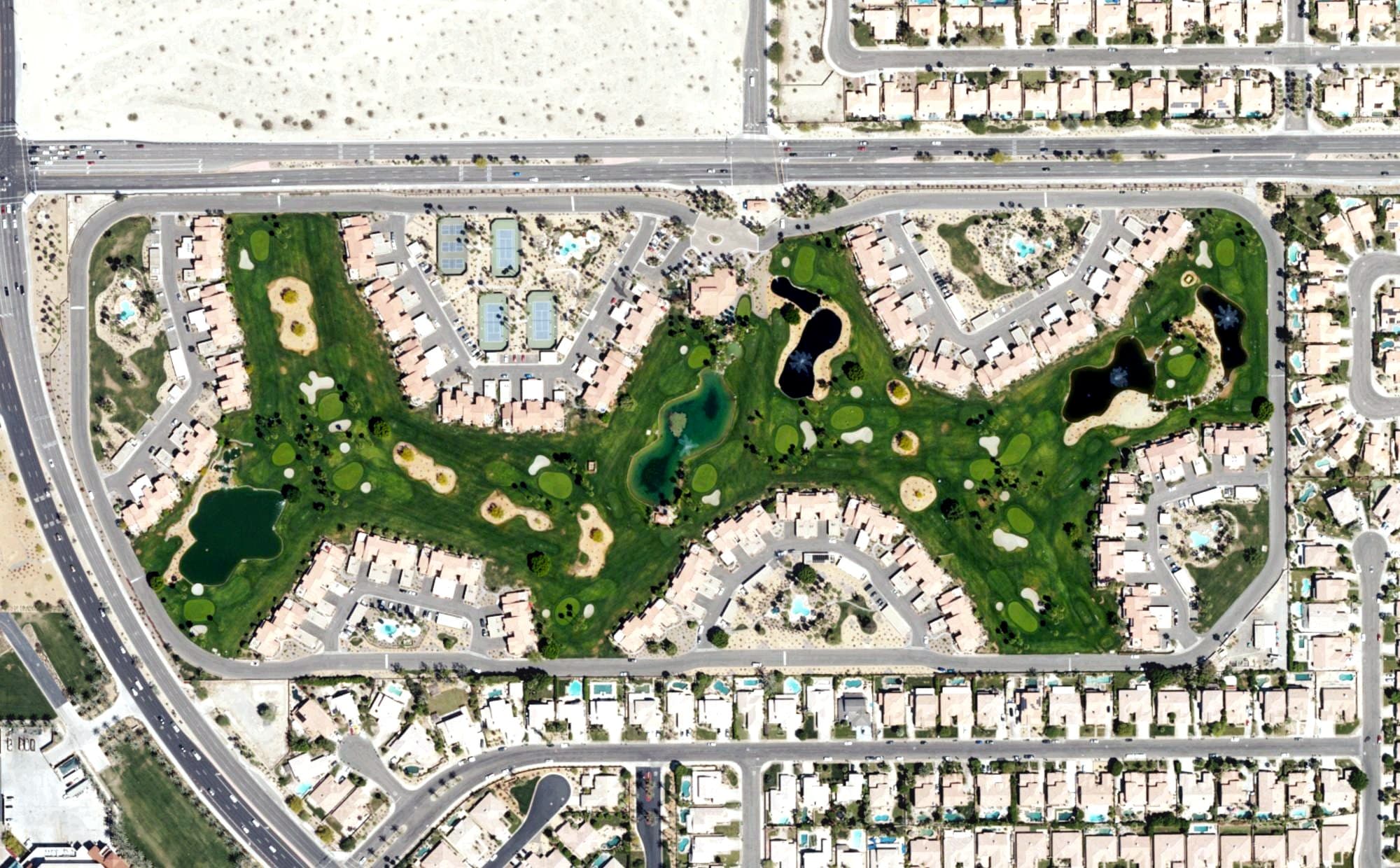 Aerial view of Palm Royale Country Club, CA, with its hole routing marked