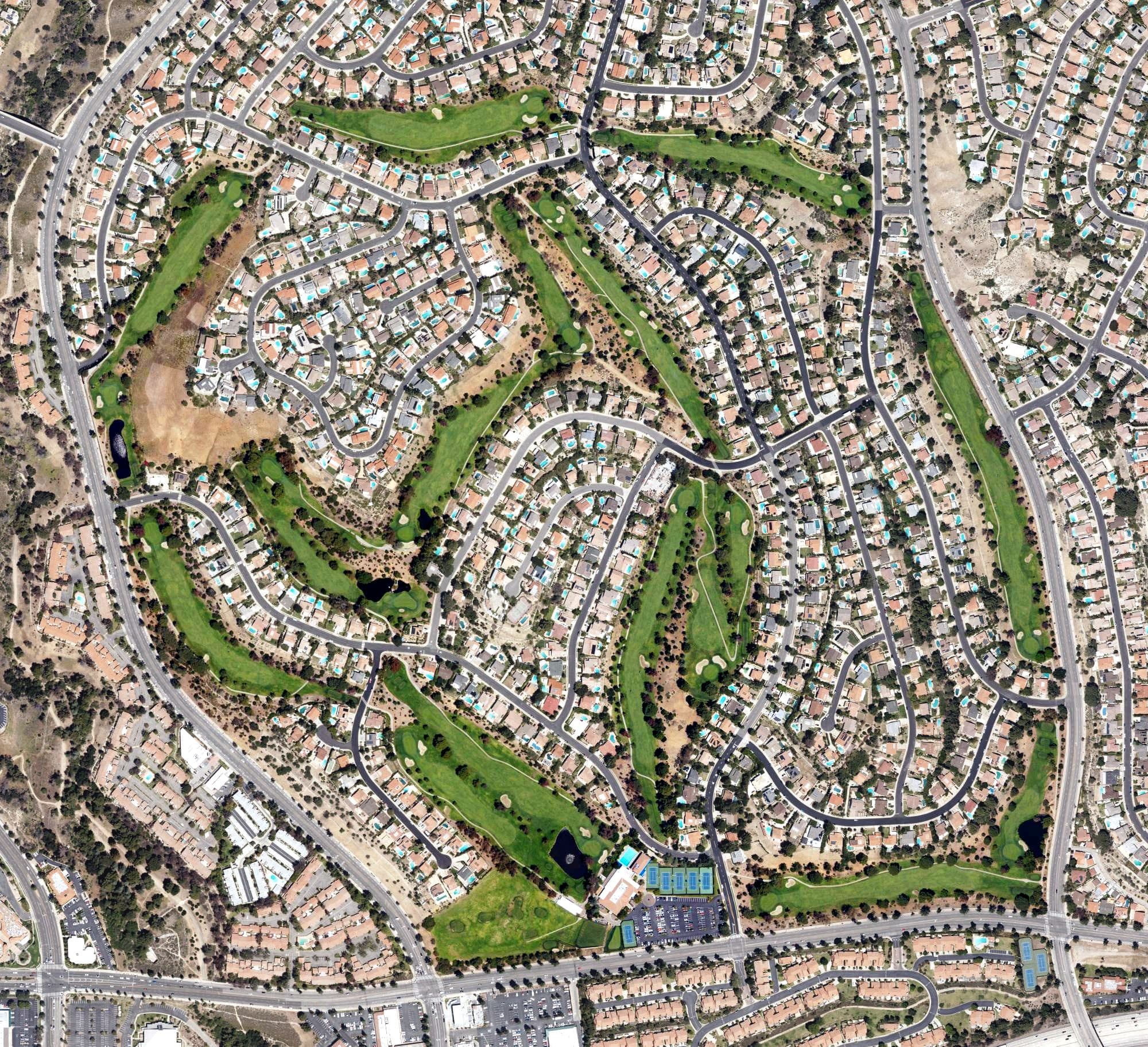 Aerial view of Porter Valley Country Club, CA, with its hole routing marked