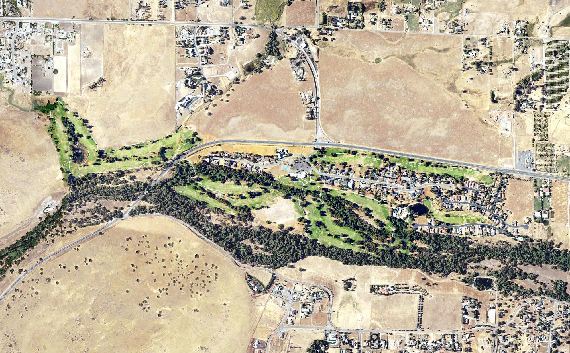 Aerial view of River Island Golf Course, CA, with its hole routing marked