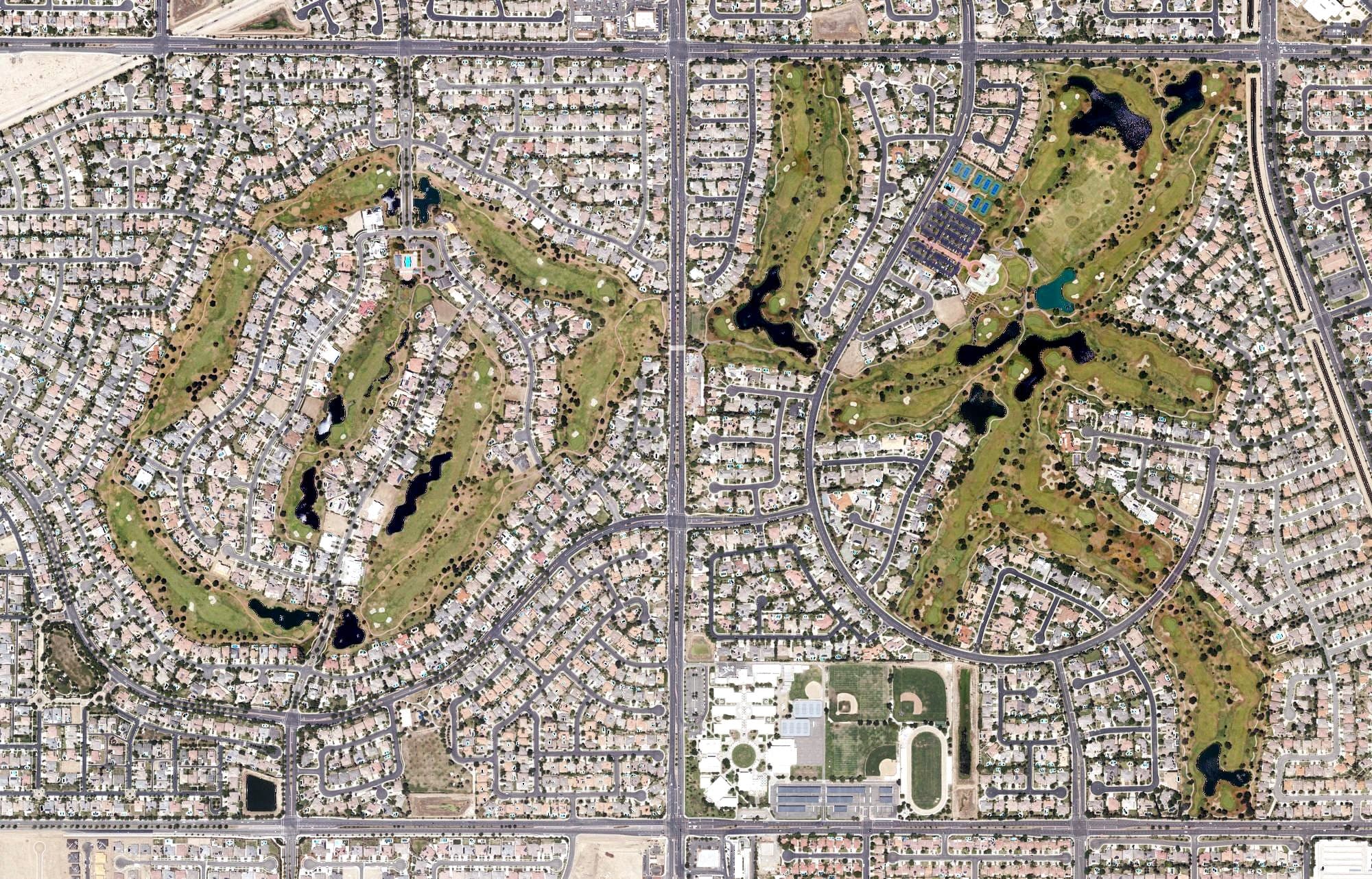 Aerial view of Seven Oaks Golf & Country Club at Grand Island, CA, with its hole routing marked