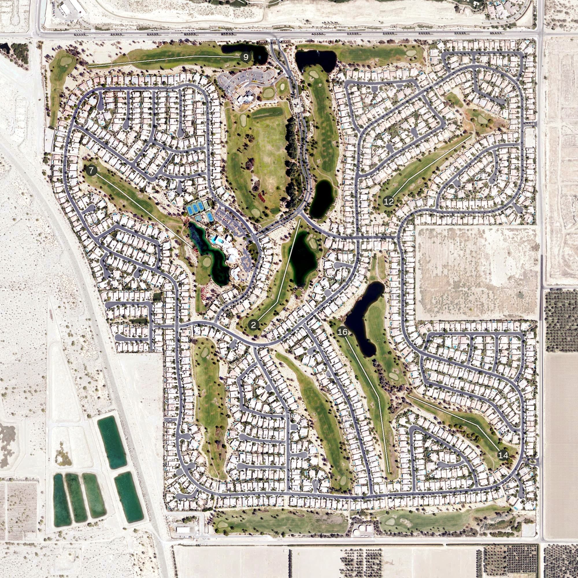 Aerial view of Trilogy Golf Club at La Quinta, CA, with its hole routing marked