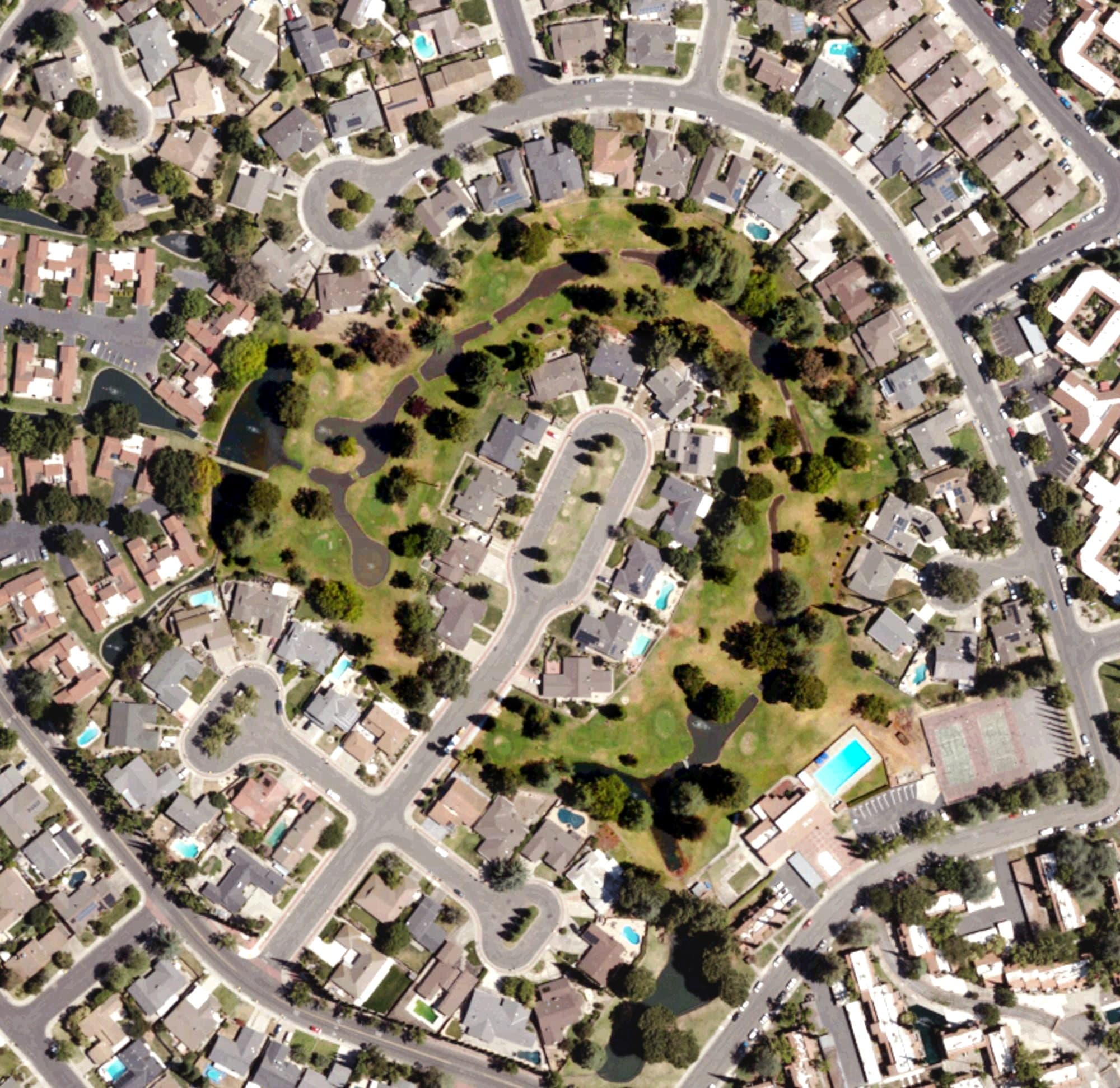 Aerial view of Venetian Gardens Golf Course, CA, with its hole routing marked