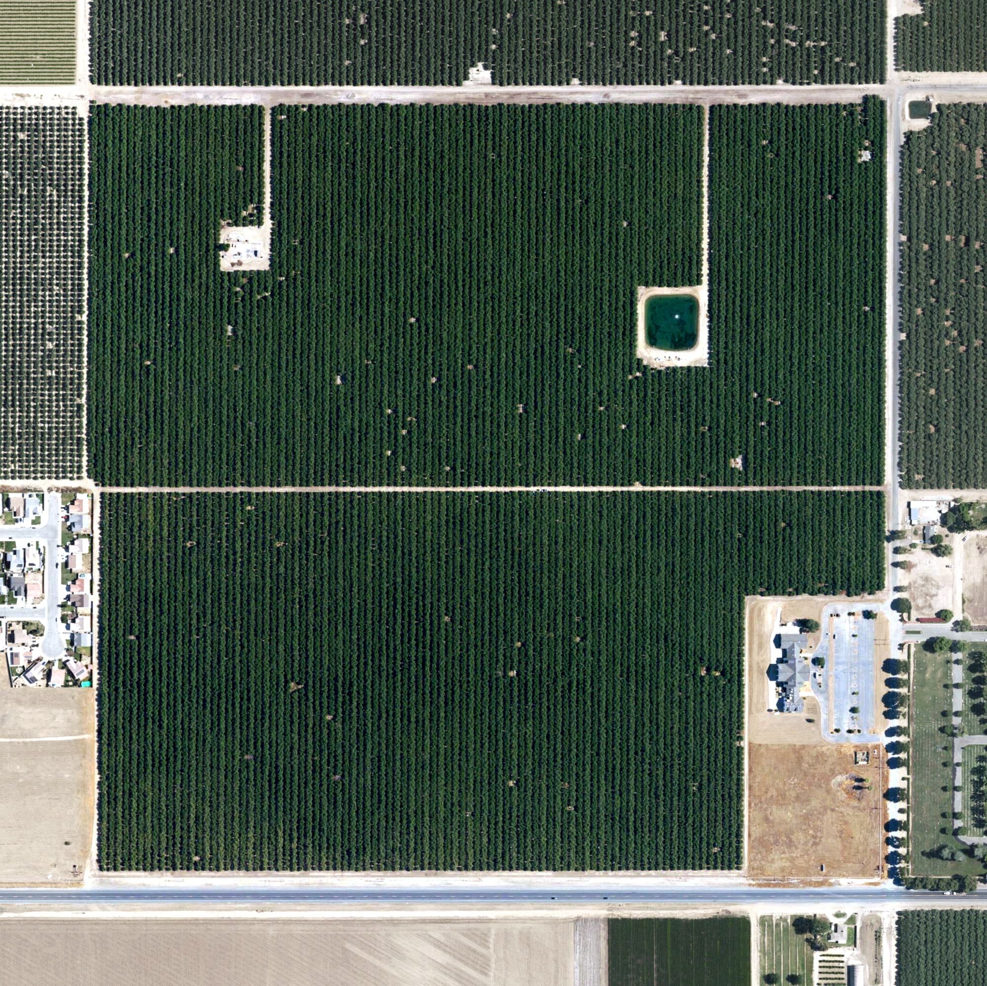 Aerial view of Wasco Valley Rose Golf Club, CA, with its hole routing marked