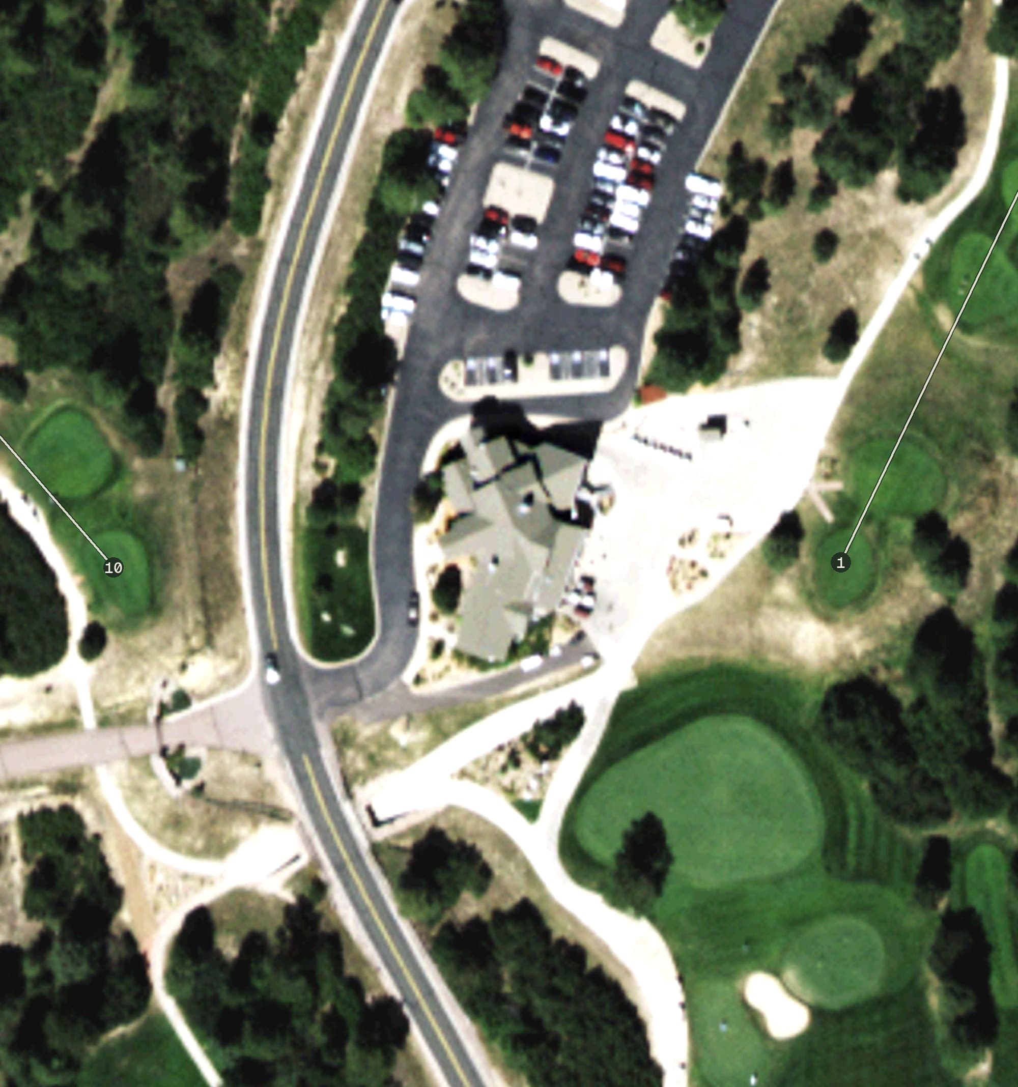 Aerial view of Golf Club at Bear Dance, CO, with its hole routing marked