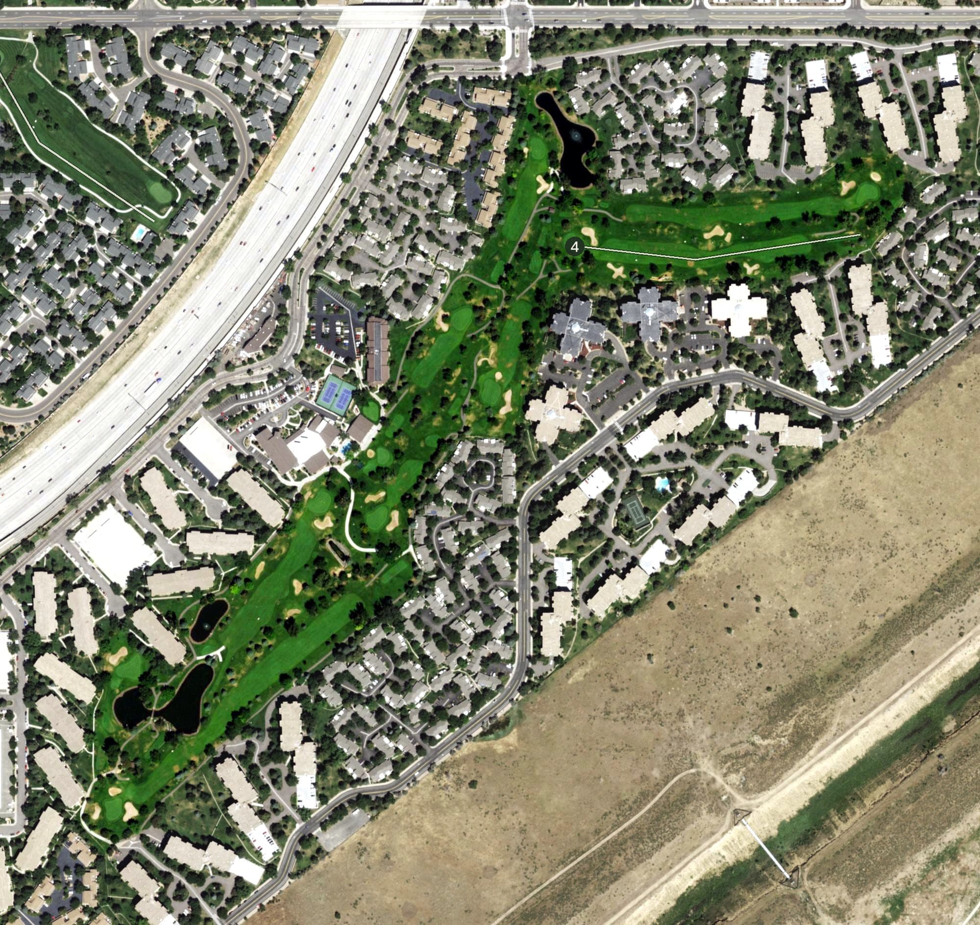 Aerial view of Heather Gardens Executive Golf Course, CO, with its hole routing marked