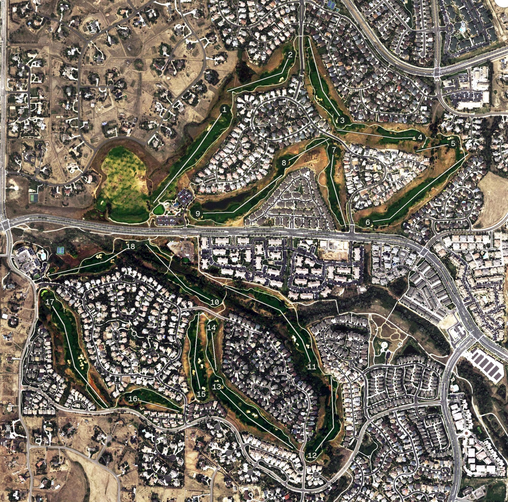 Aerial view of Saddle Rock Golf Course, CO, with its hole routing marked