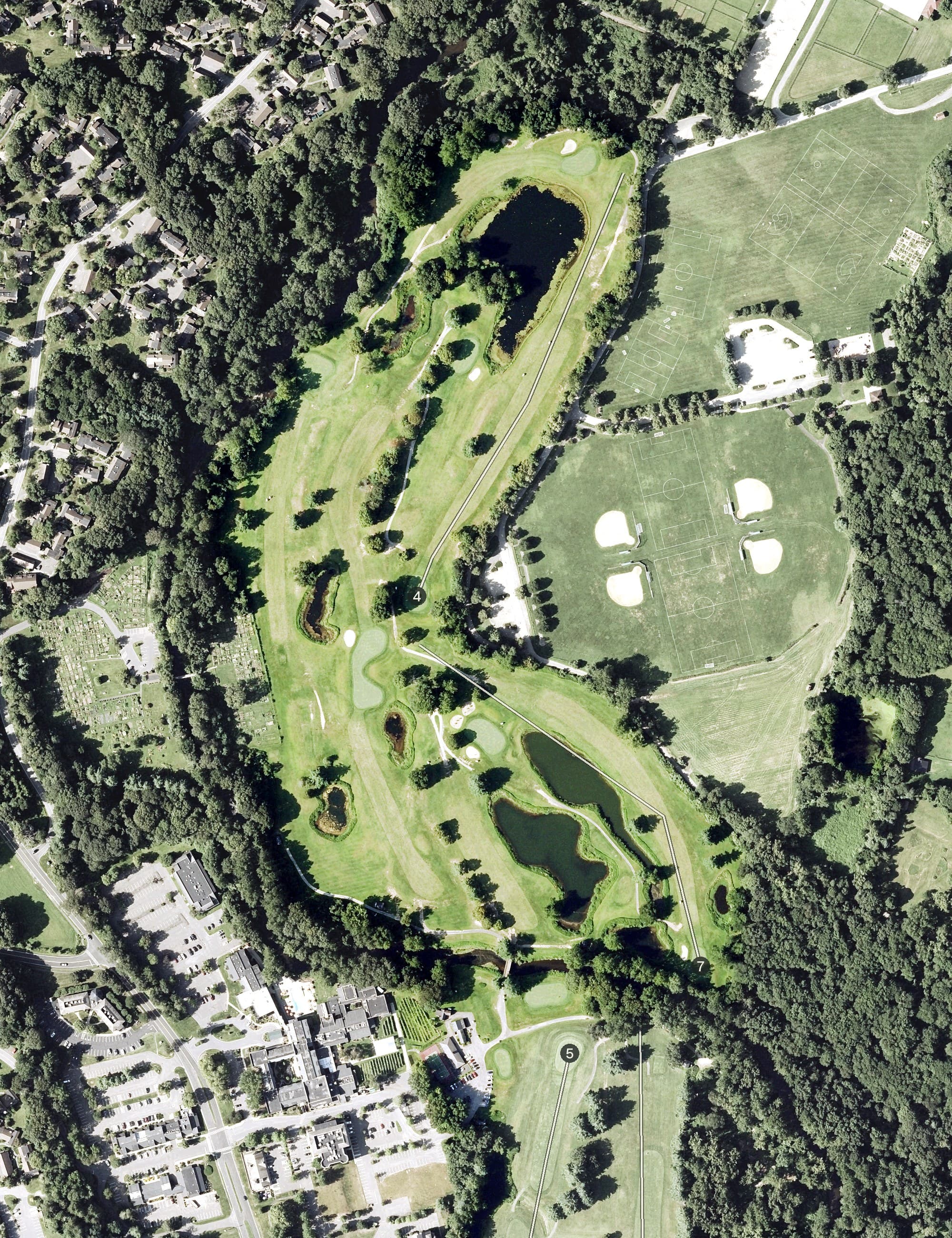 Aerial view of Pomperaug Golf Club, CT, with its hole routing marked