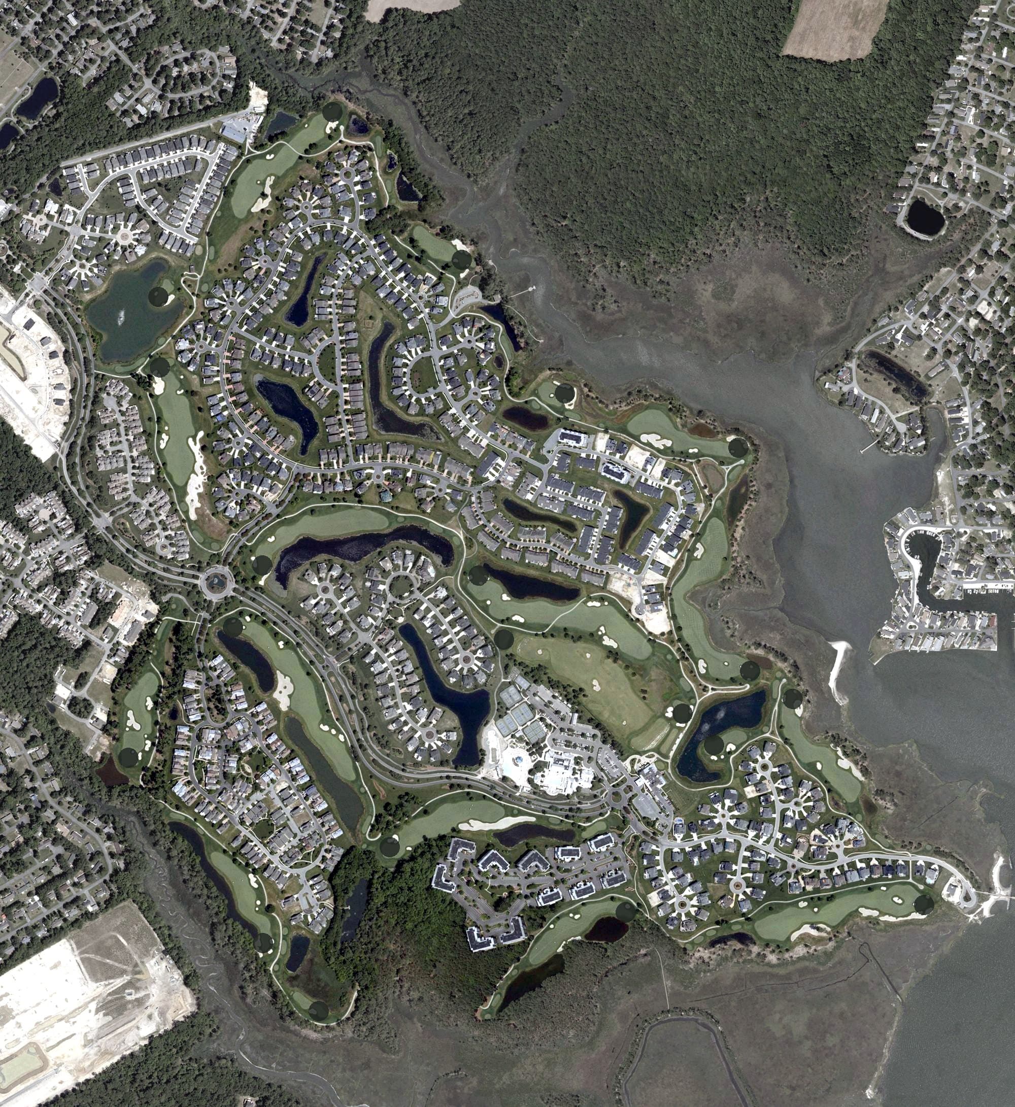 Aerial view of The Peninsula Golf and County Club, DE, with its hole routing marked