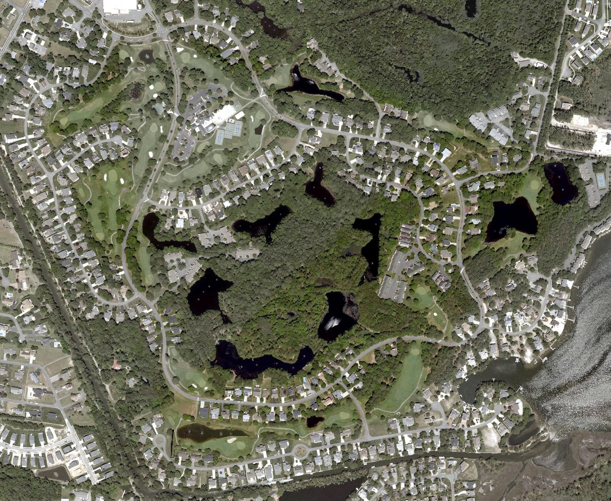 Aerial view of The Salt Pond Golf Club, DE, with its hole routing marked