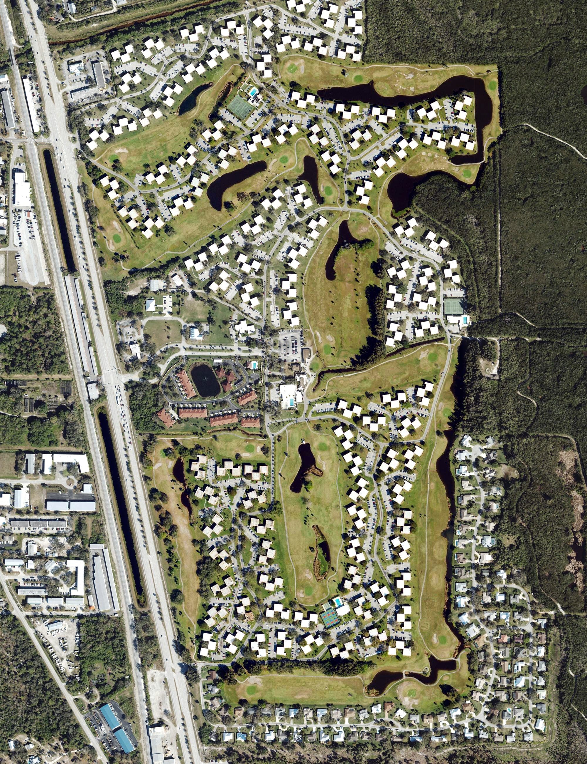 Aerial view of American Golf Club, FL, with its hole routing marked