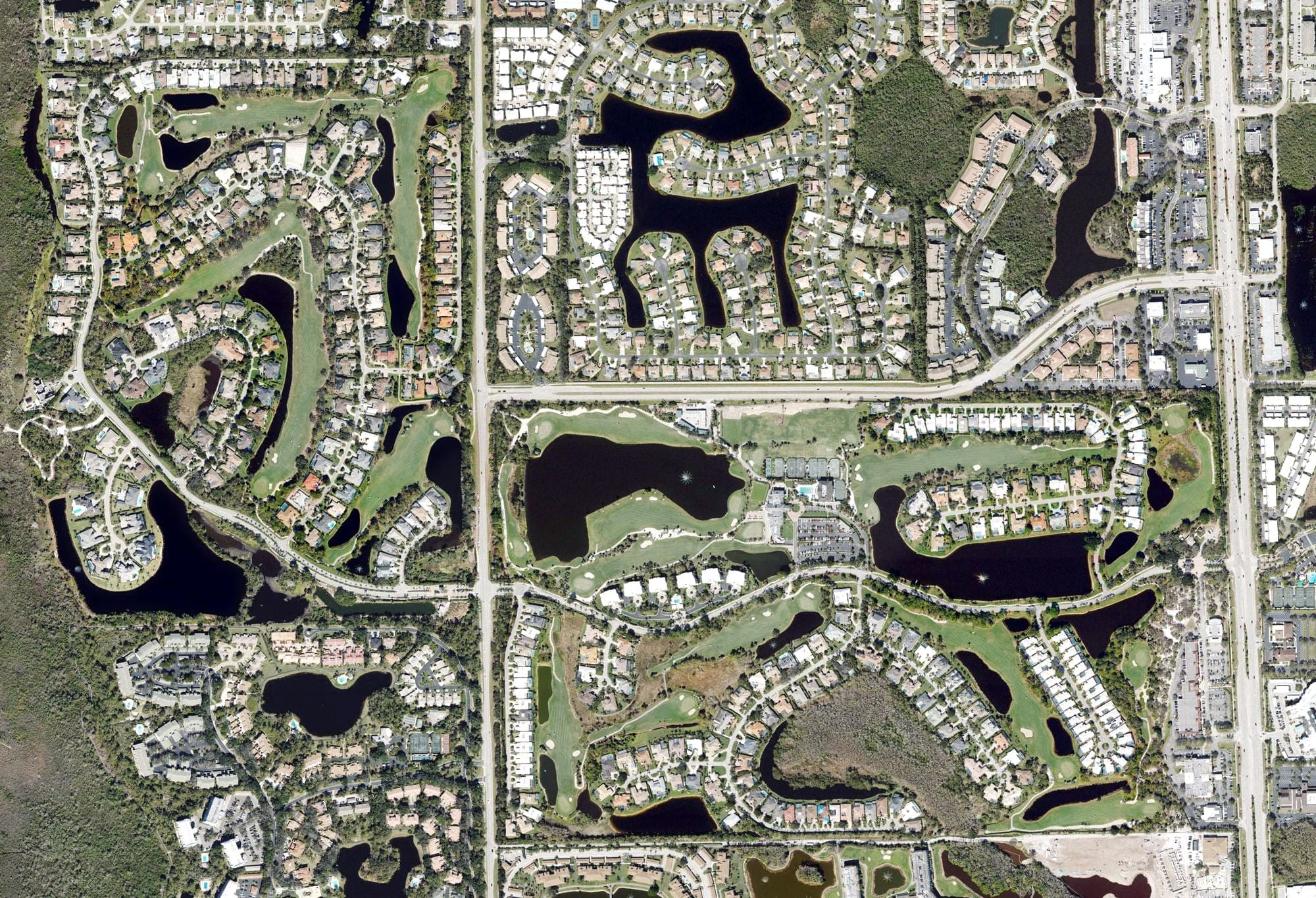 Aerial view of Audubon Country Club, FL, with its hole routing marked