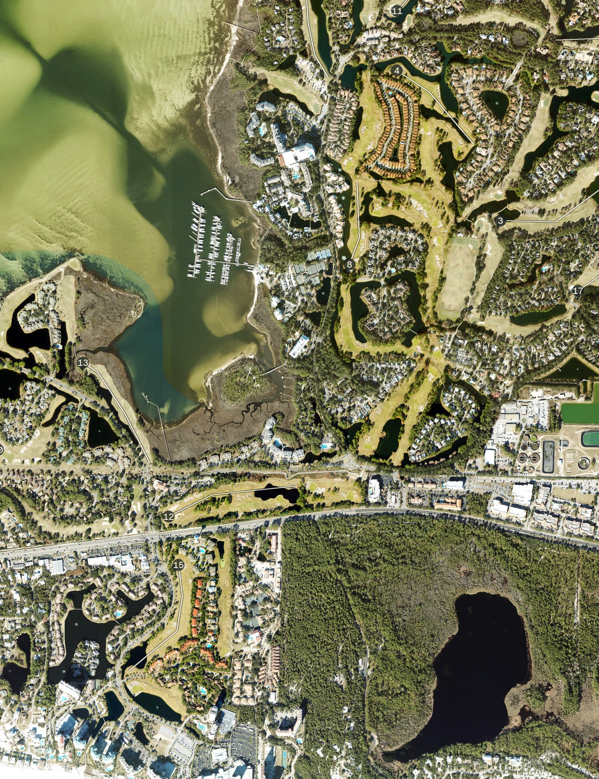 Aerial view of Baytowne Golf Club, FL, with its hole routing marked