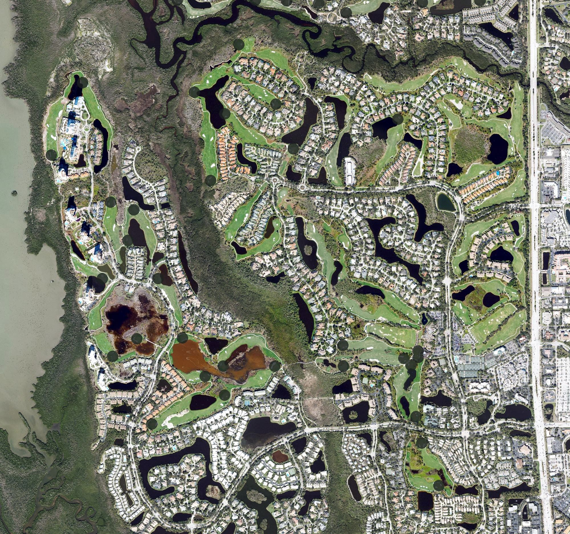 Aerial view of Bonita Bay Club West, FL, with its hole routing marked