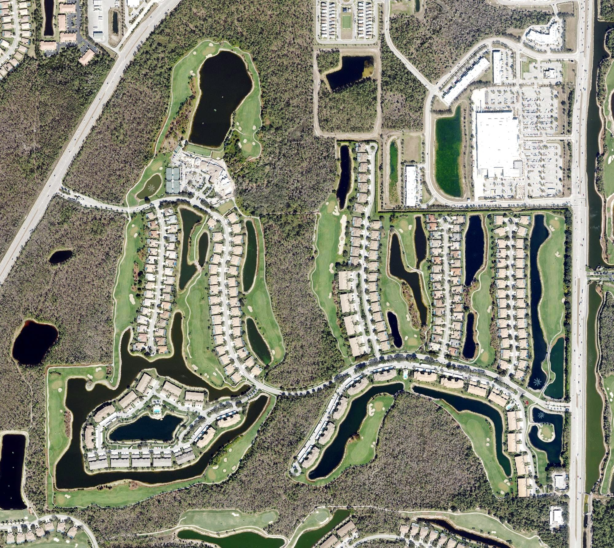 Aerial view of Cedar Hammock Golf & Country Club, FL, with its hole routing marked