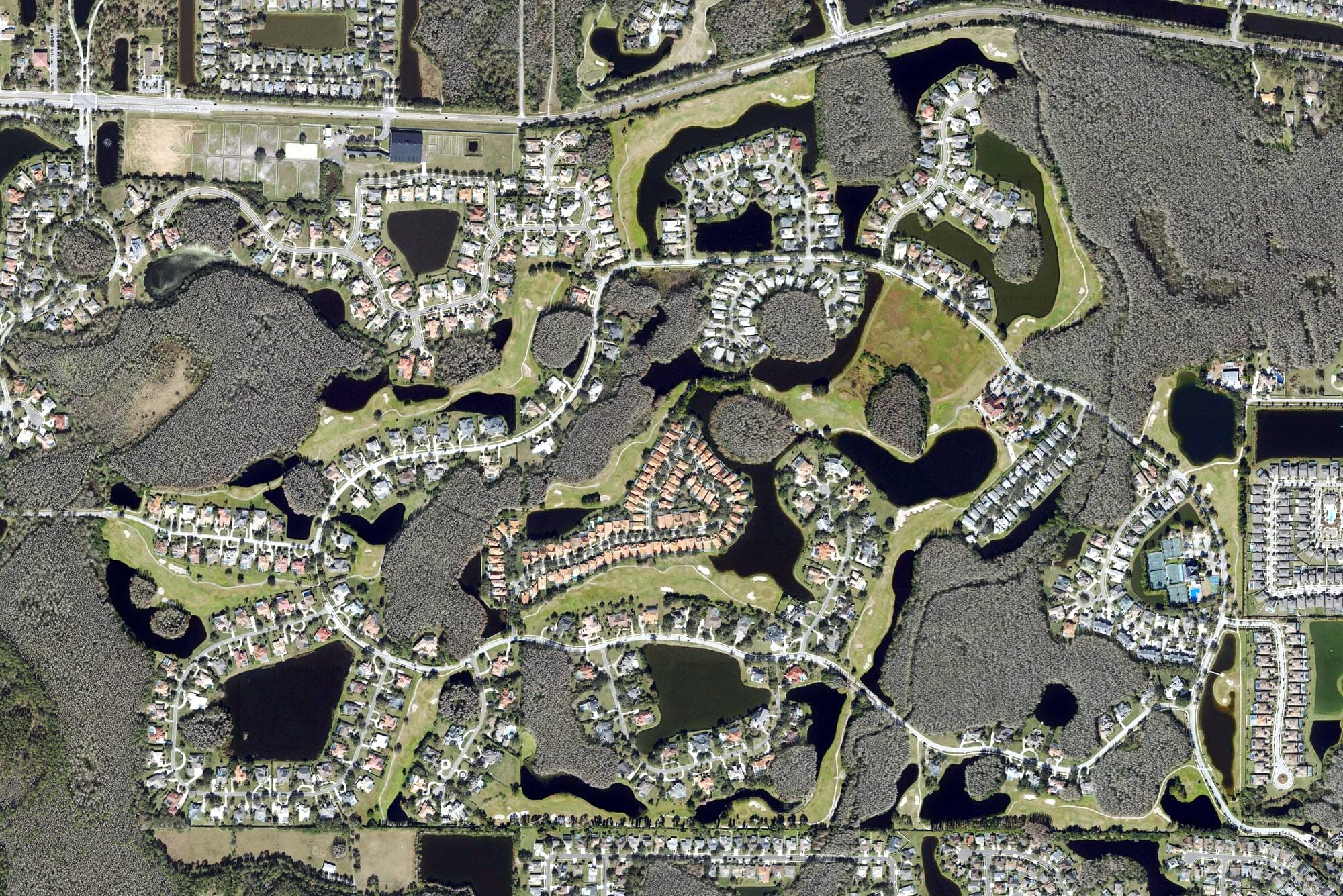 Aerial view of Cheval Golf & Country Club, FL, with its hole routing marked