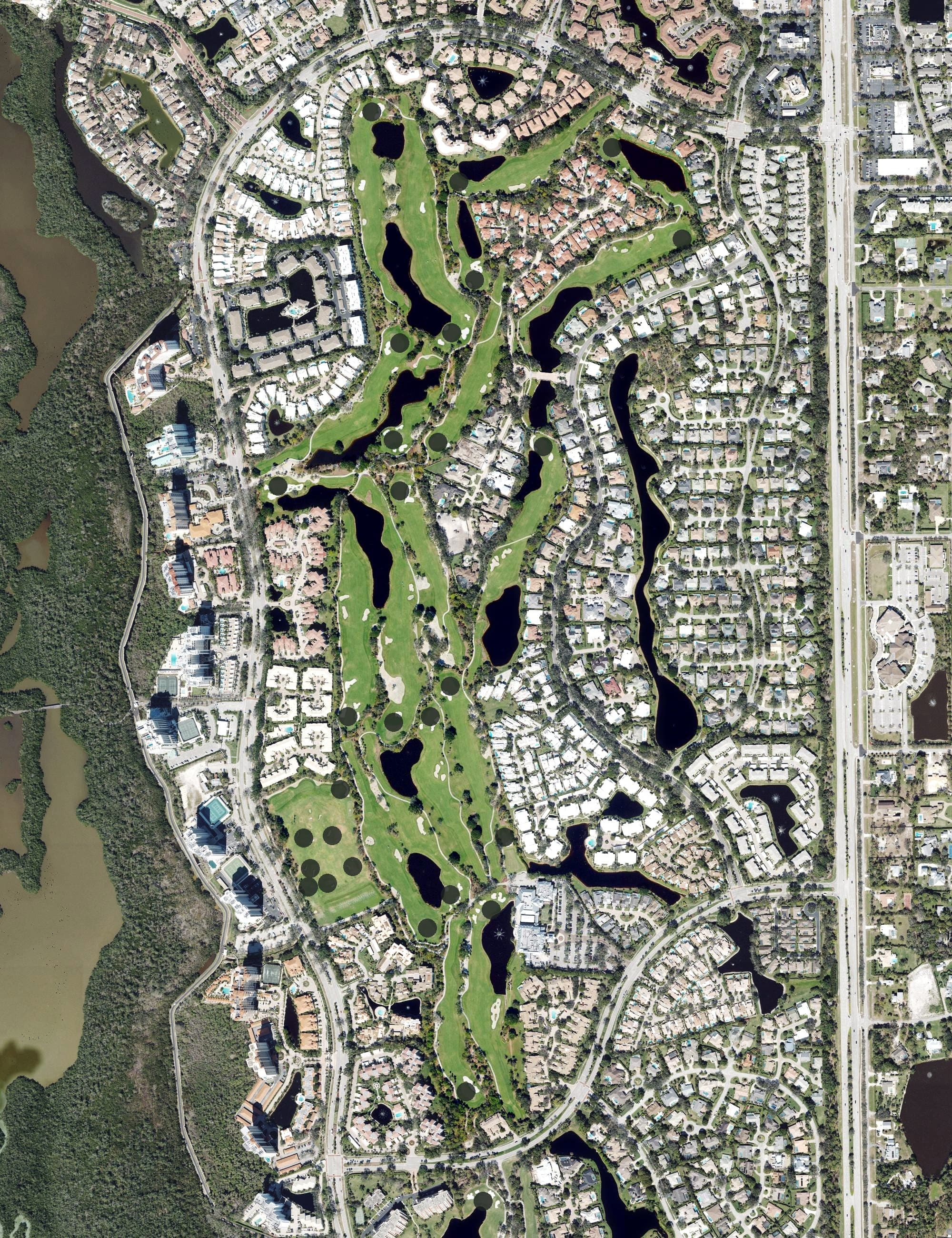 Aerial view of Club Pelican Bay, FL, with its hole routing marked