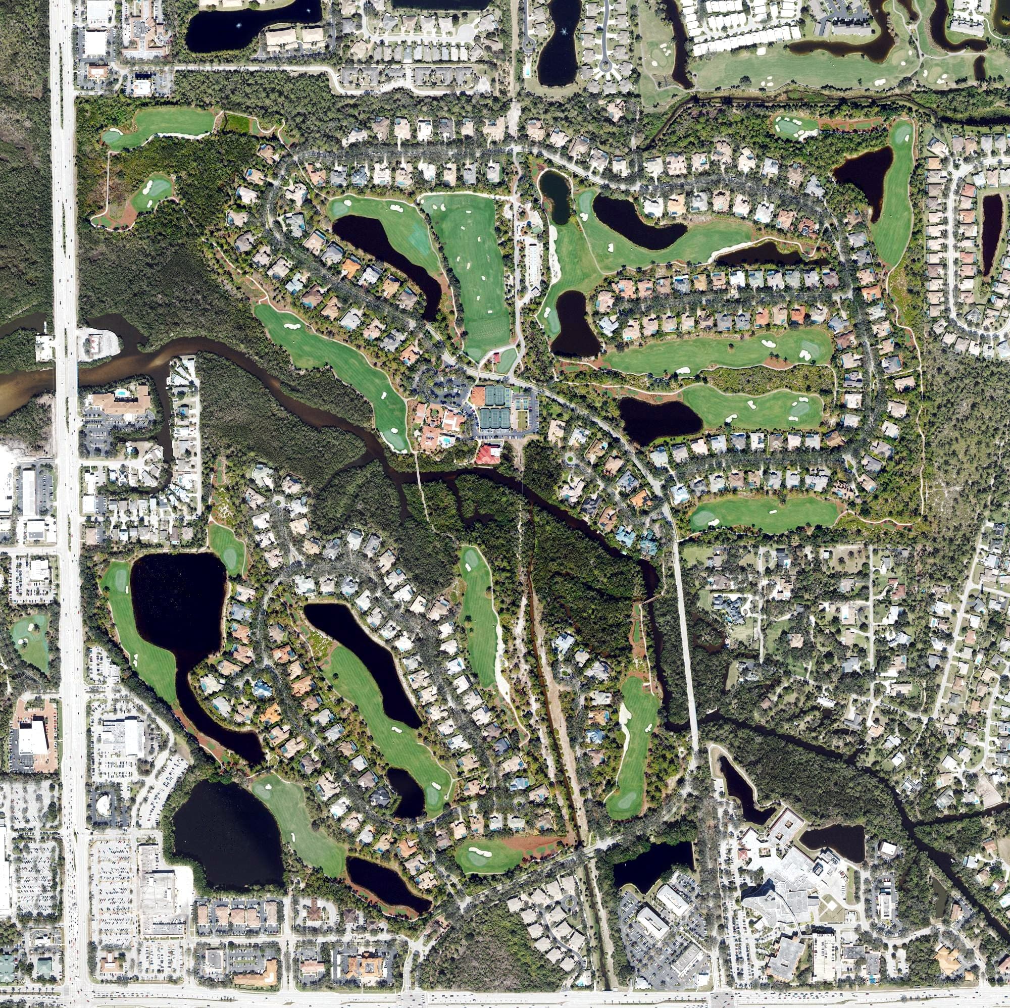 Aerial view of Collier’s Reserve Country Club, FL, with its hole routing marked