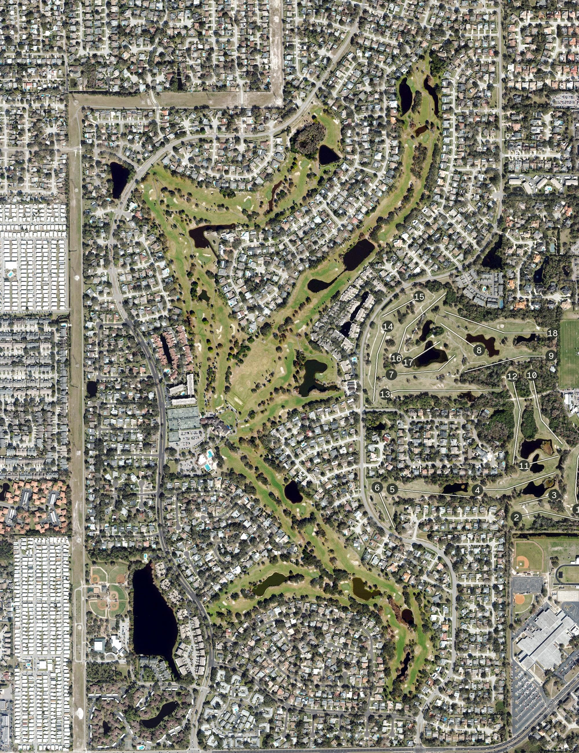 Aerial view of Countryside Country Club, FL, with its hole routing marked