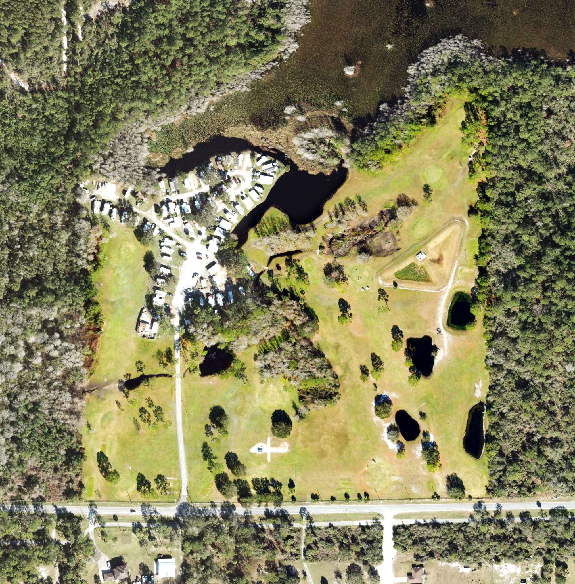 Aerial view of Cypress Point Golf Club, FL, with its hole routing marked