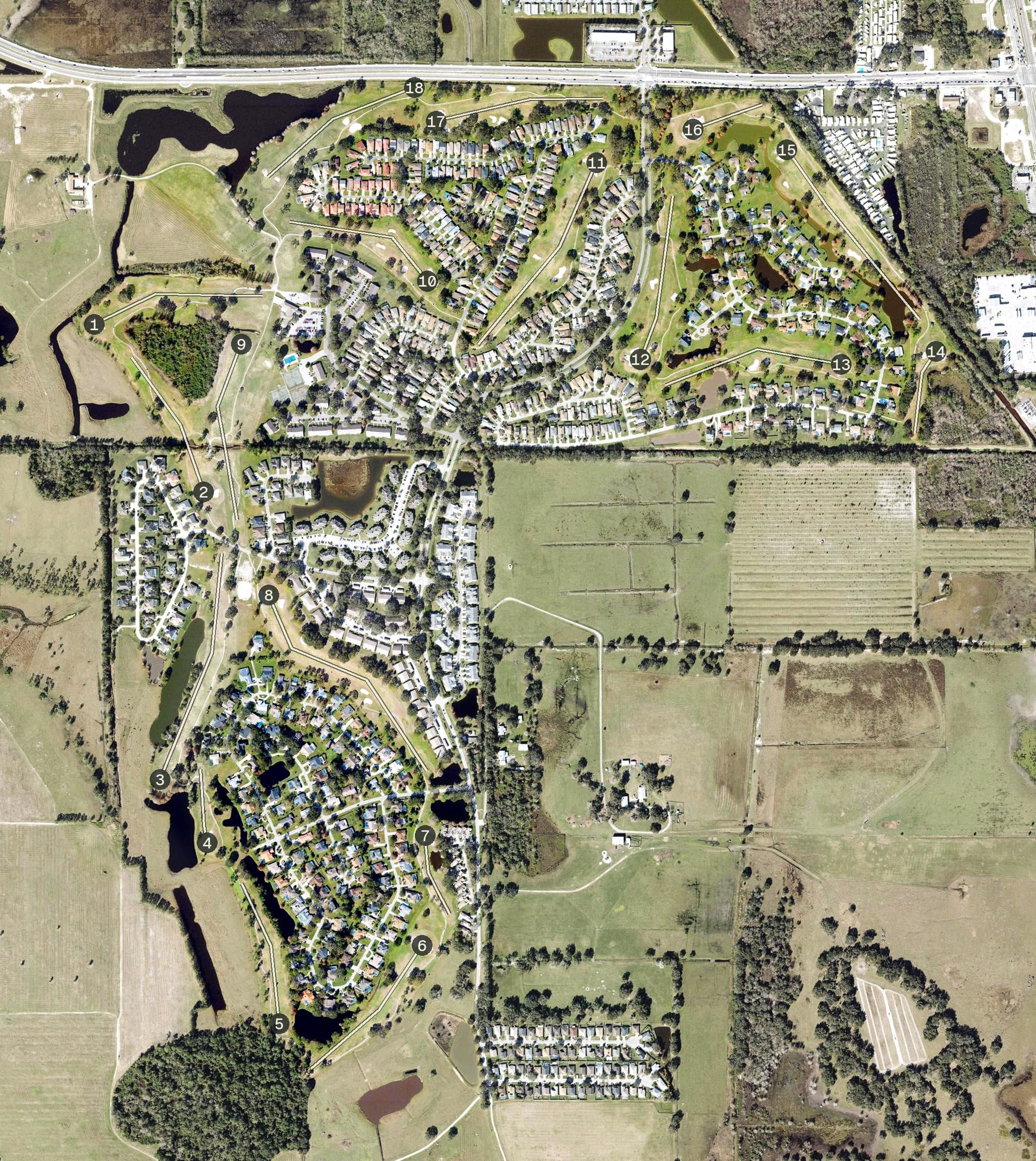 Aerial view of Cypresswood Golf & Country Club, FL, with its hole routing marked