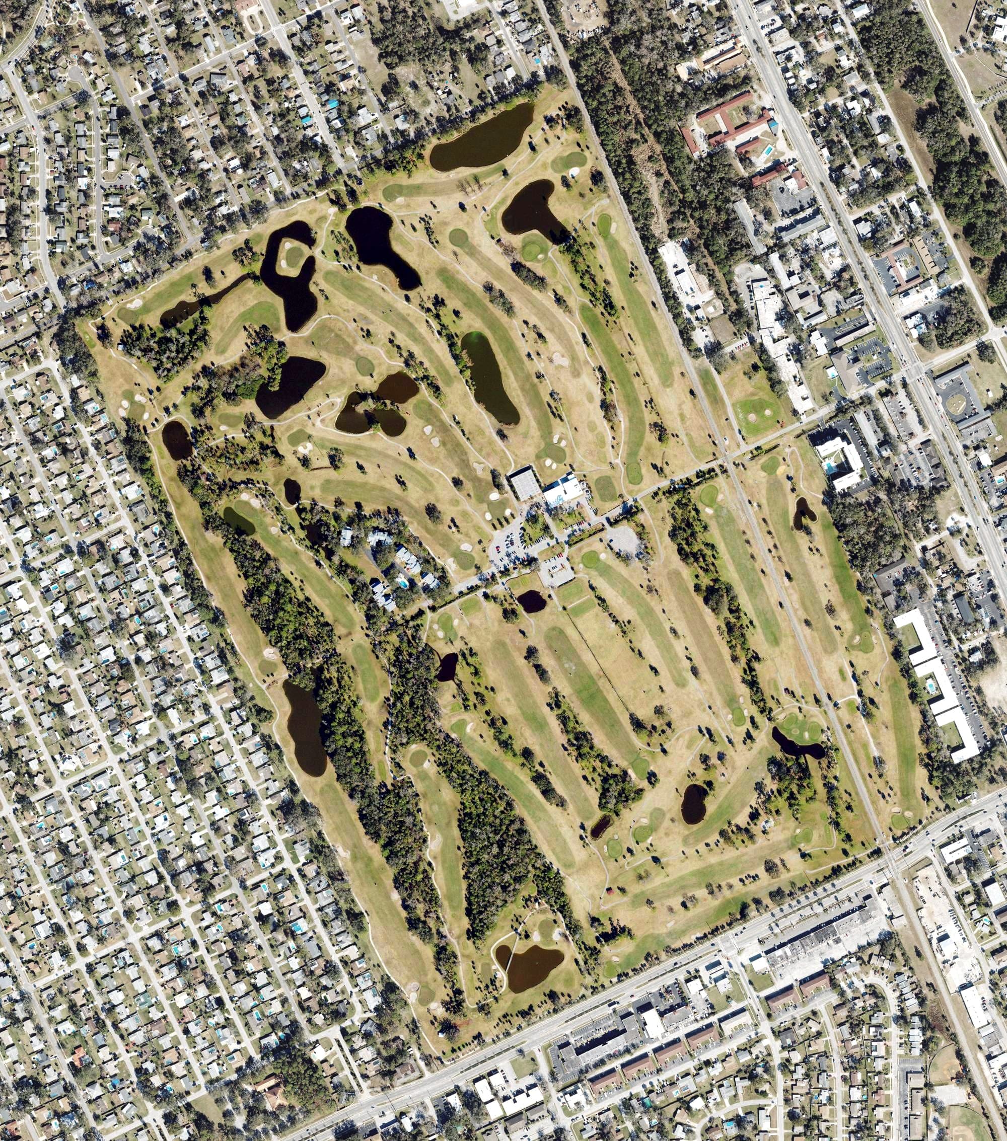 Aerial view of Daytona Beach Golf Club, FL, with its hole routing marked