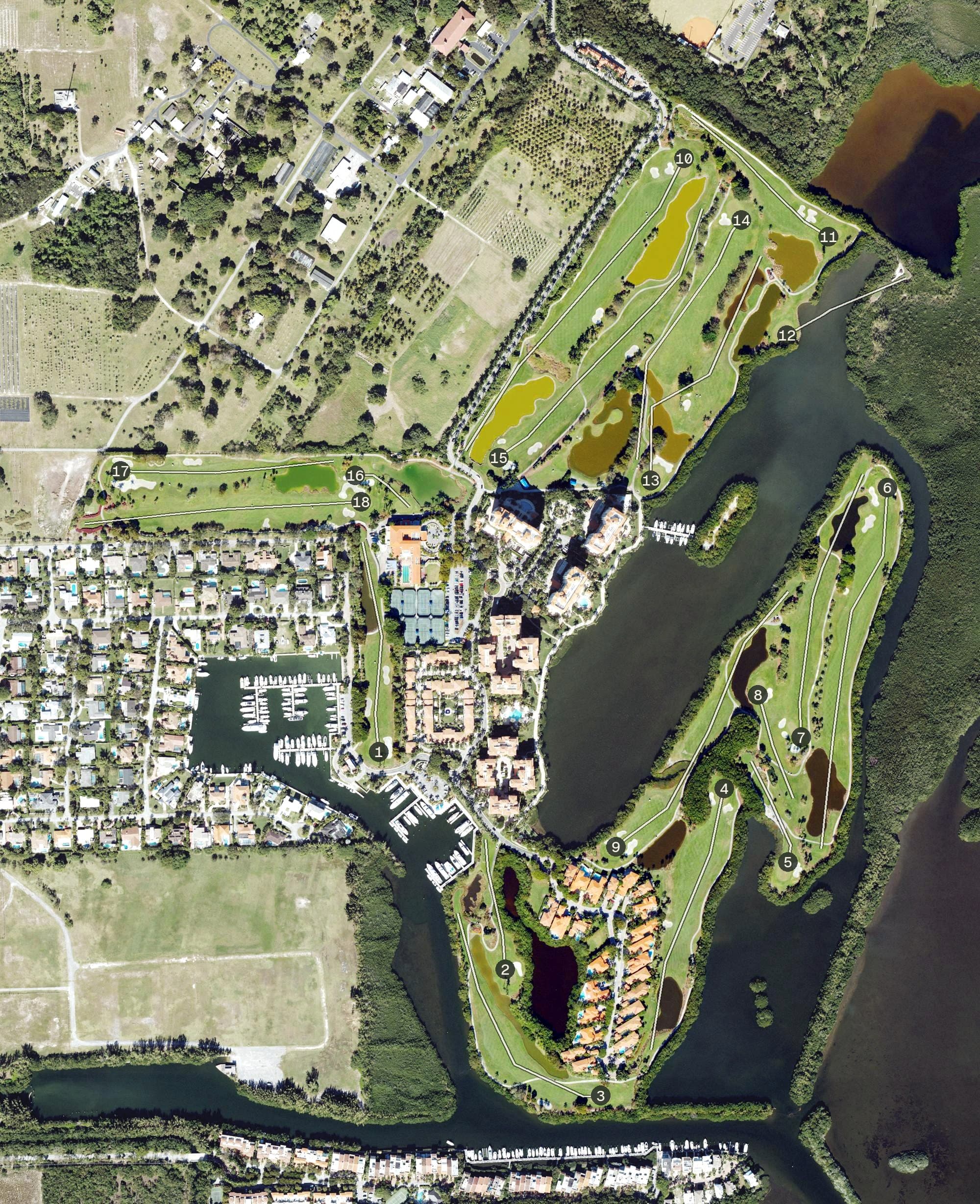 Aerial view of Deering Bay Yacht & Country Club, FL, with its hole routing marked