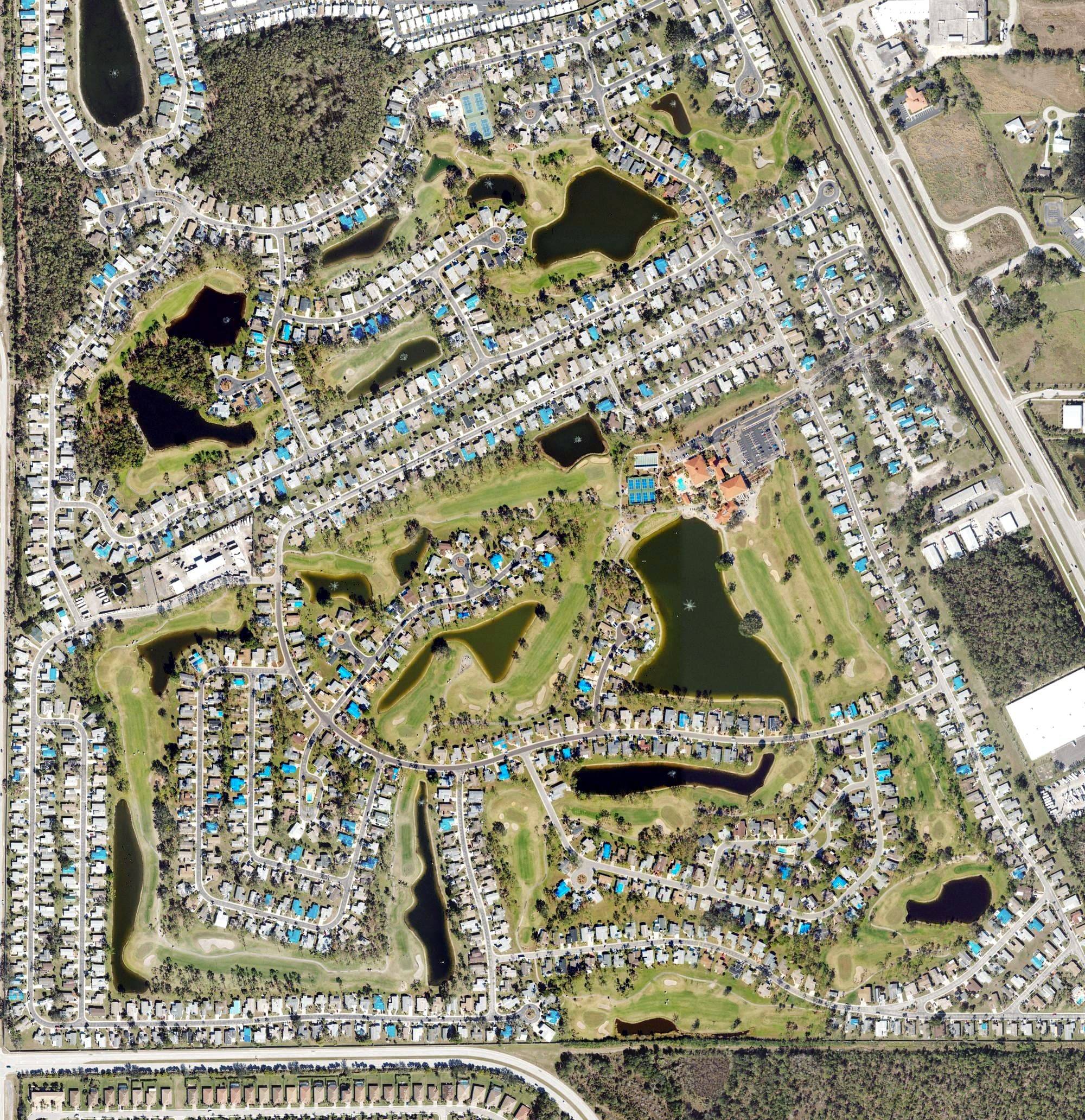 Aerial view of Del Tura Golf Club, FL, with its hole routing marked