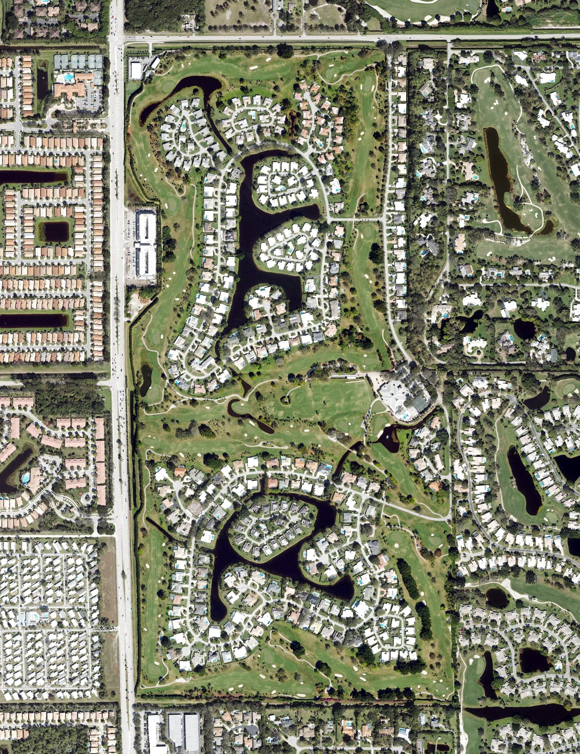 Aerial view of Delray Dunes Golf and Country Club, FL, with its hole routing marked