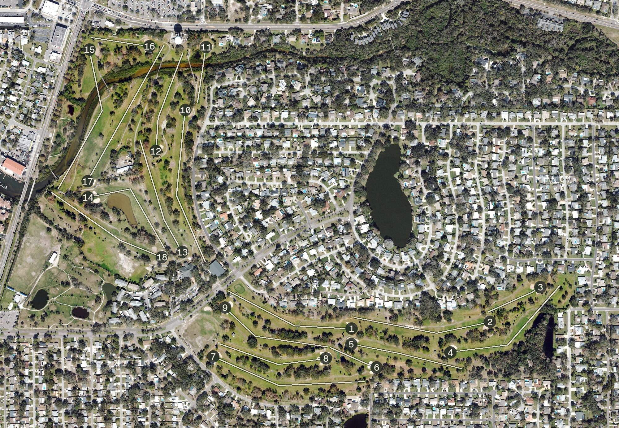 Aerial view of Dunedin Golf Club, FL, with its hole routing marked