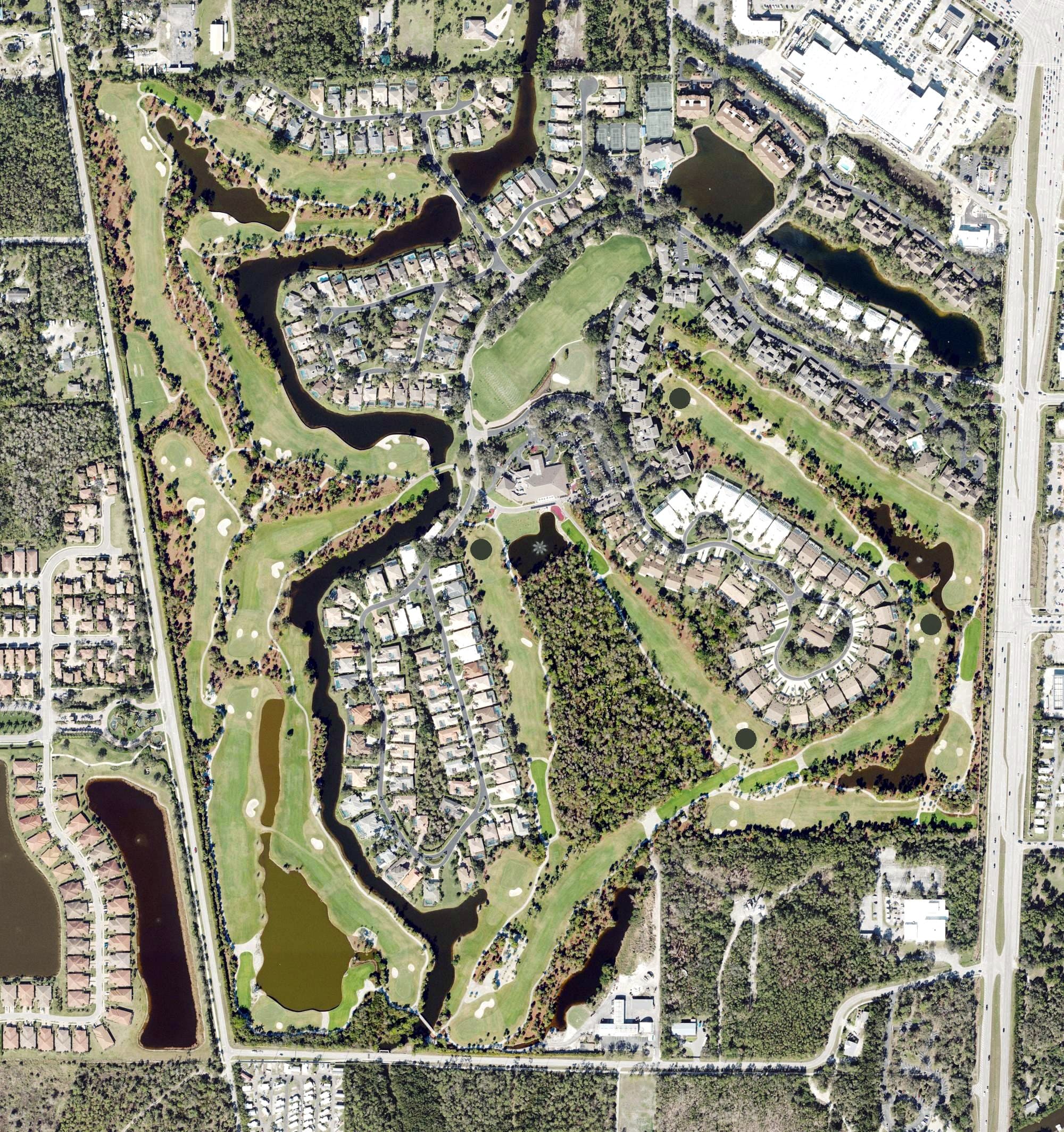 Aerial view of Eagle Creek Golf & Country Club, FL, with its hole routing marked