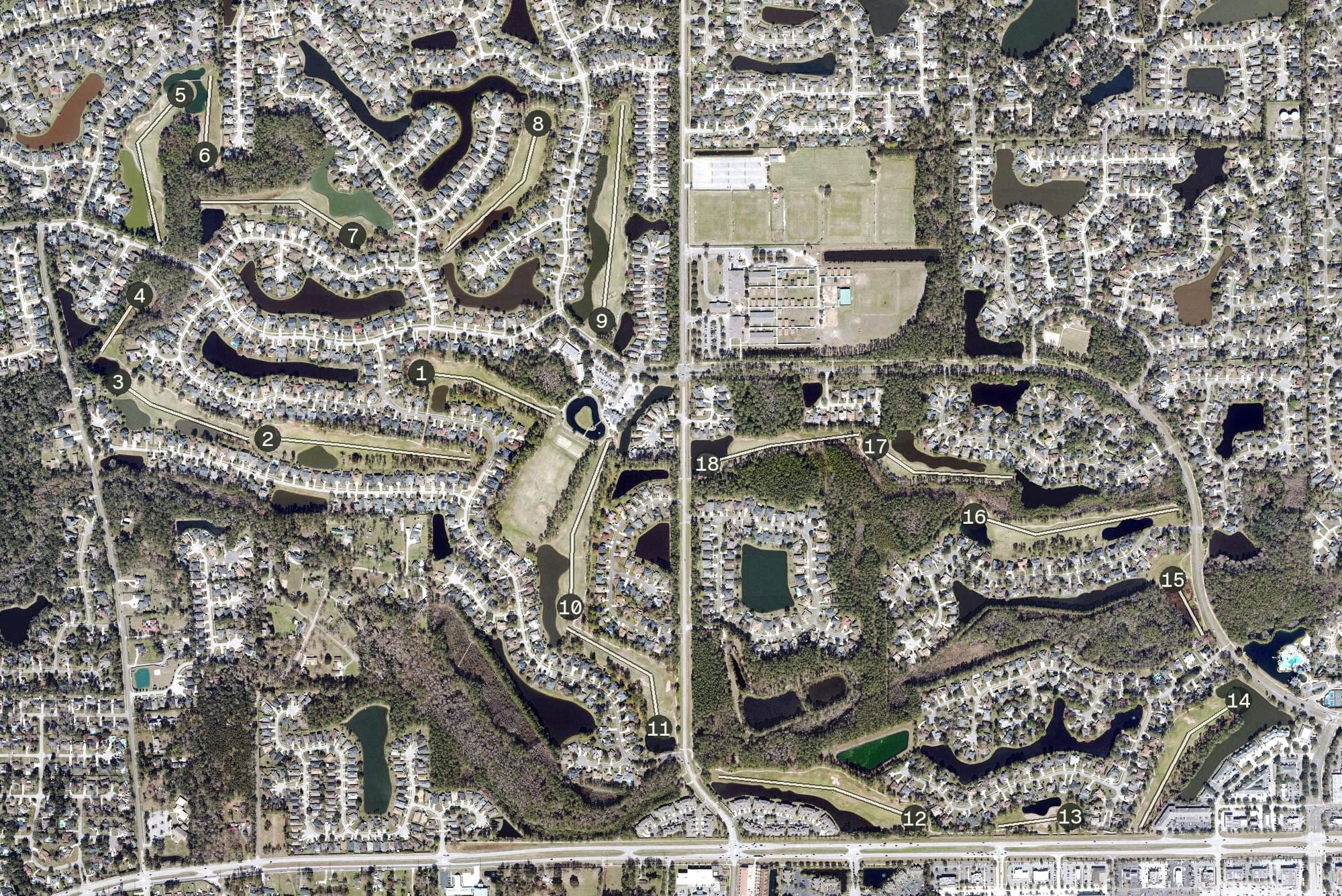 Aerial view of Eagle Harbor Golf Club, FL, with its hole routing marked